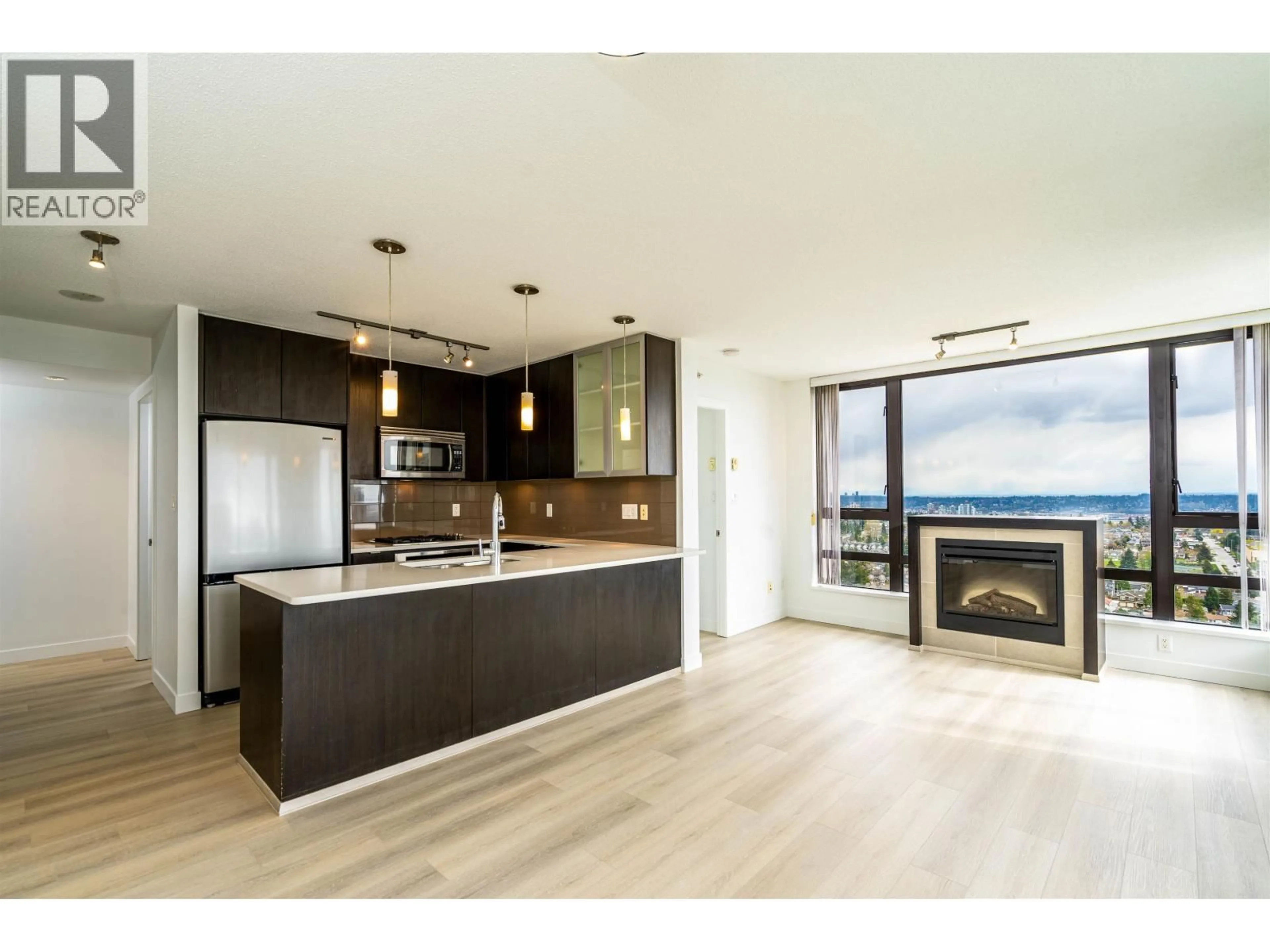 Open concept kitchen, wood/laminate floor for 1805 - 7328 ARCOLA STREET, Burnaby British Columbia V5E0A7