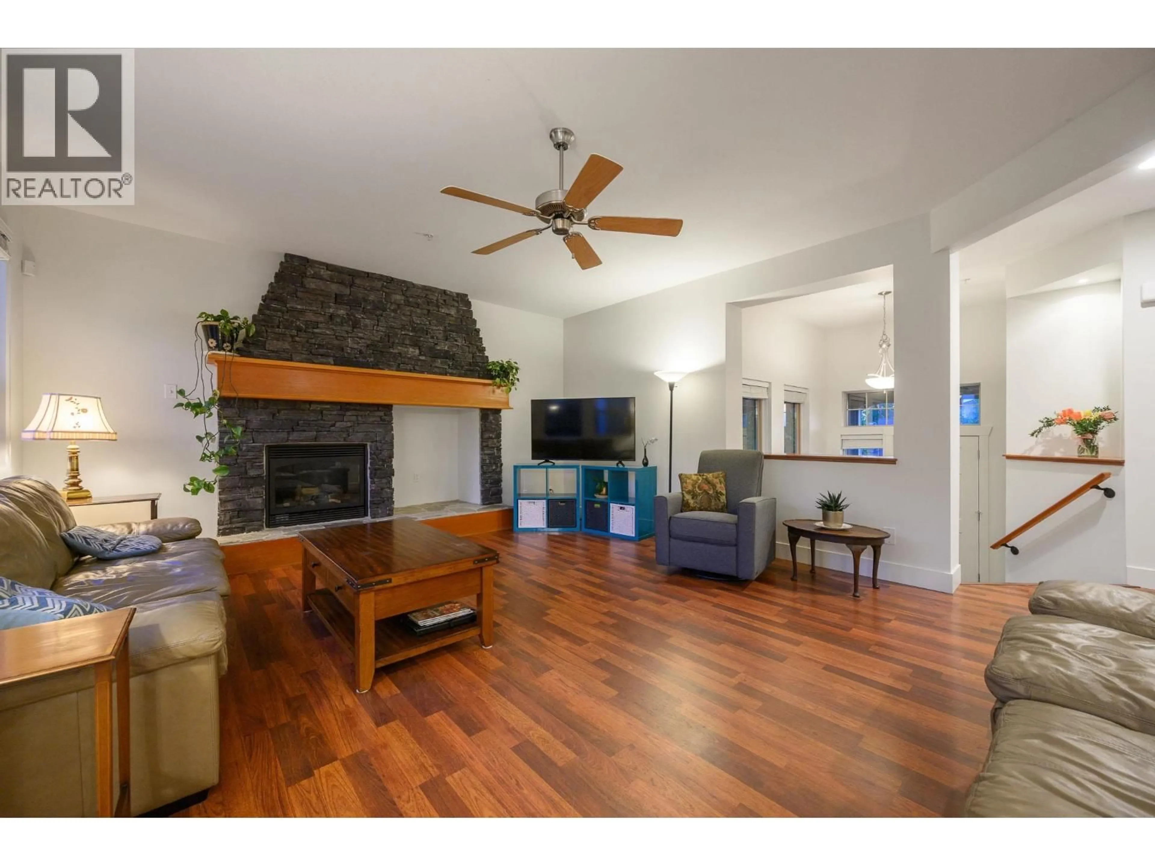 Living room with furniture, wood/laminate floor for 10676 247A STREET, Maple Ridge British Columbia V2W0A6