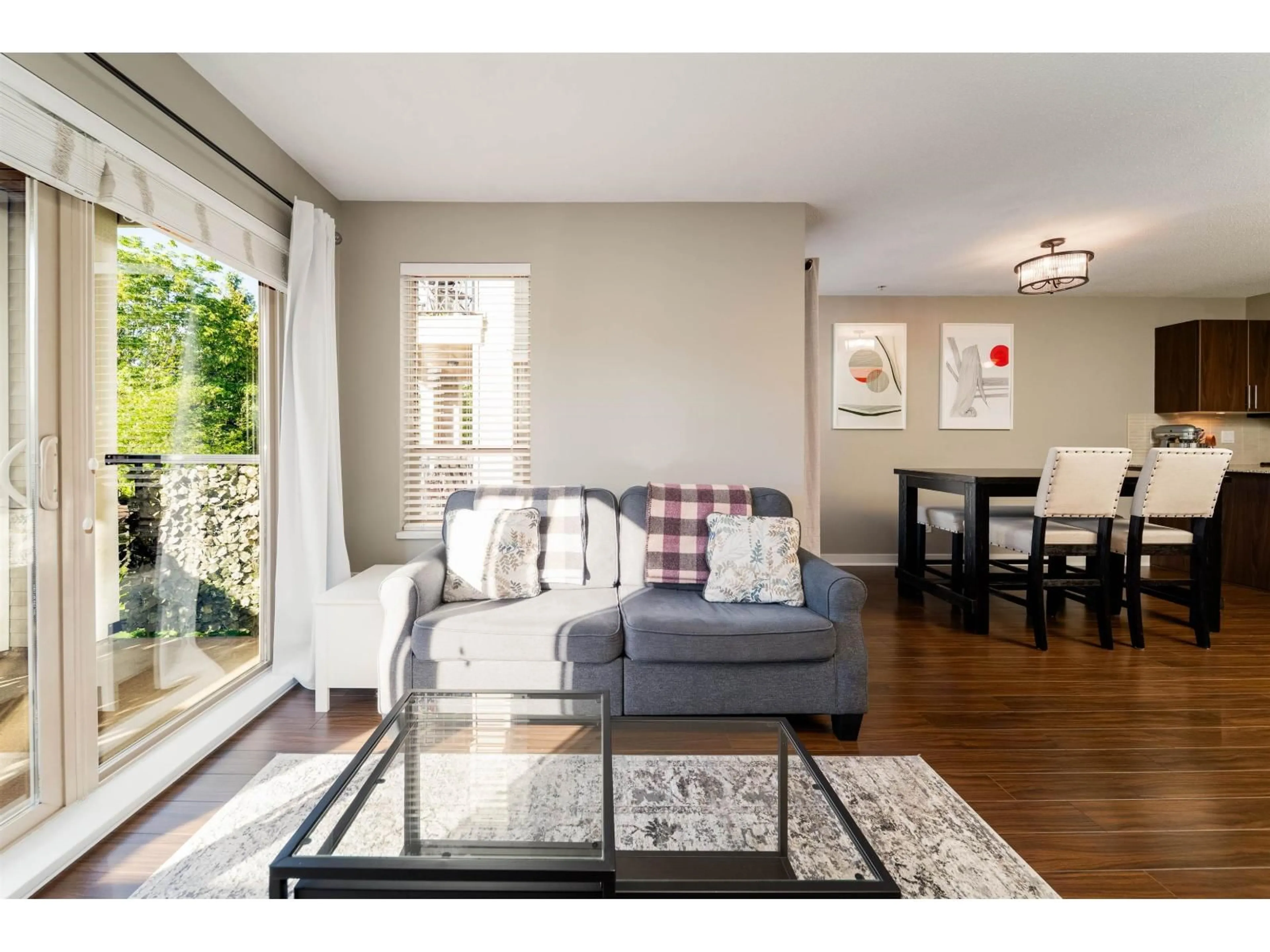Living room with furniture, wood/laminate floor for D207 - 8929 202 STREET, Langley British Columbia V1M0B4