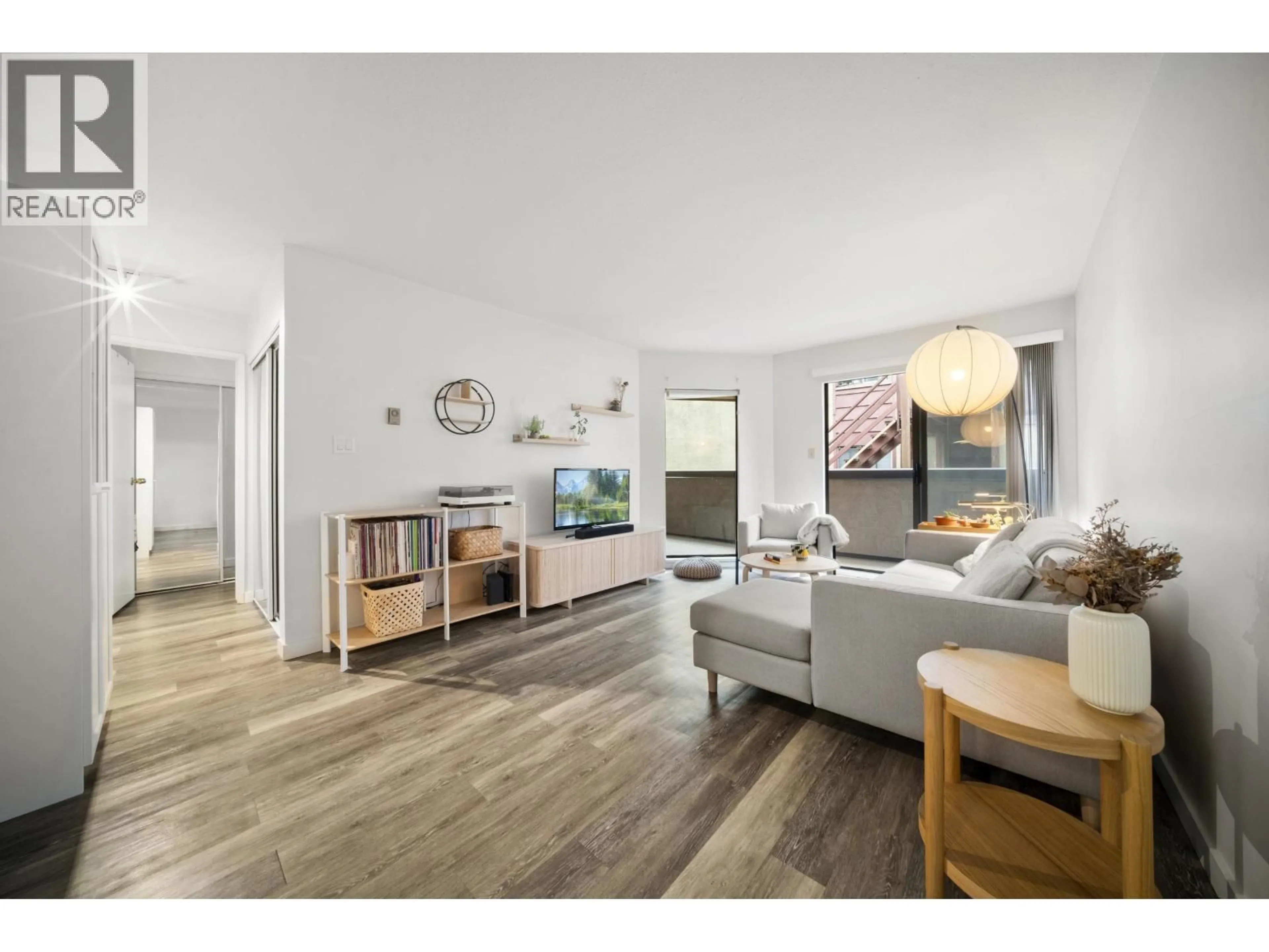 Living room with furniture, wood/laminate floor for 209 - 975 13TH AVENUE, Vancouver British Columbia V5Z1P4