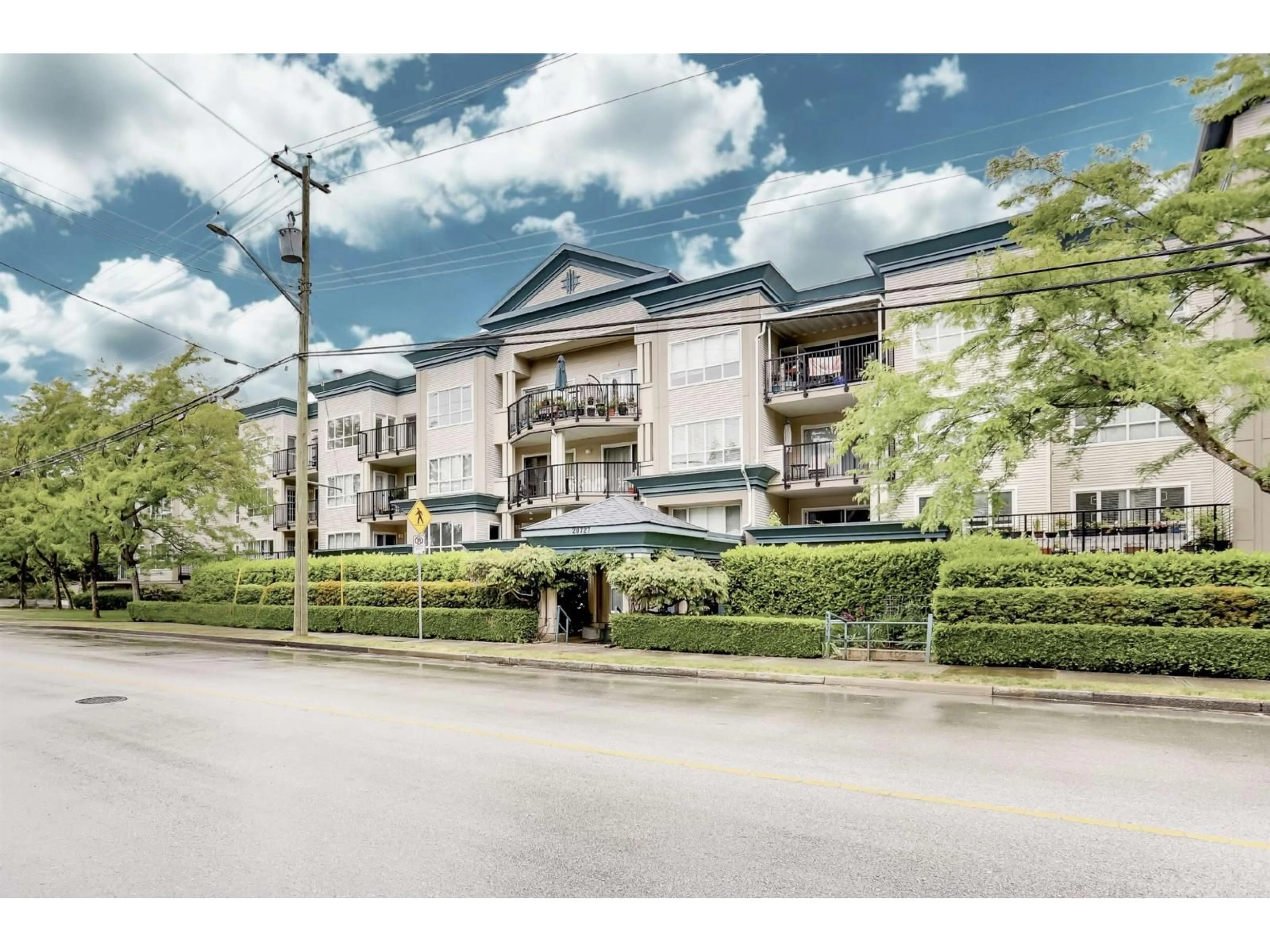 A pic from outside/outdoor area/front of a property/back of a property/a pic from drone, street for 302 - 20727 DOUGLAS CRESCENT, Langley British Columbia V3A4C1