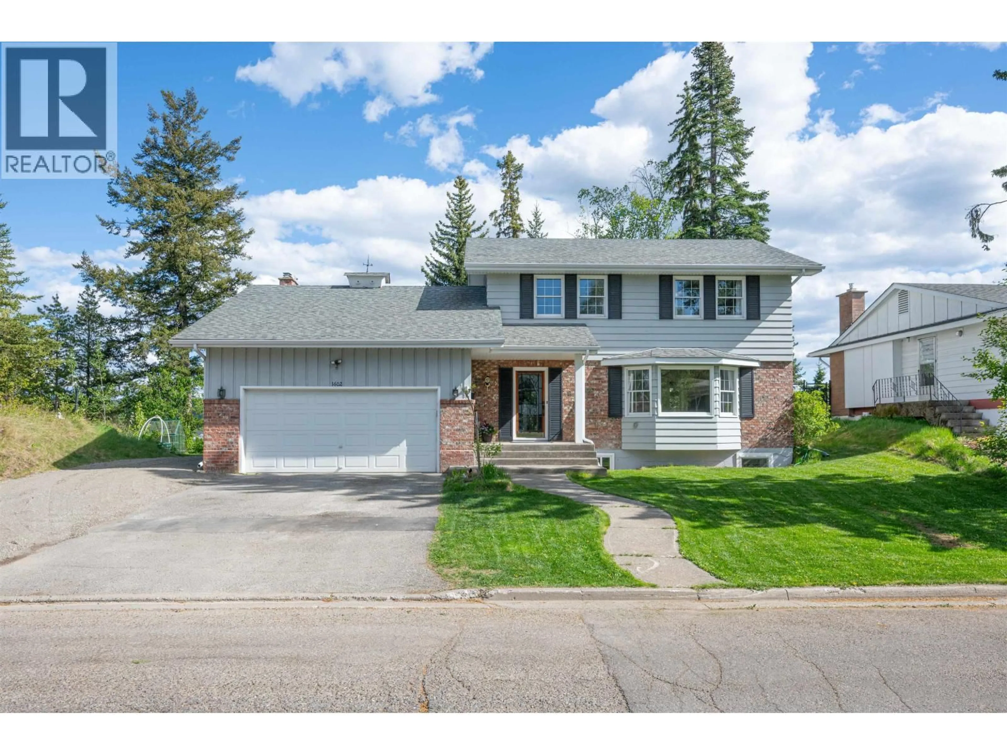 Home with vinyl exterior material, street for 1602 EDMONTON STREET, Prince George British Columbia V2M1X4