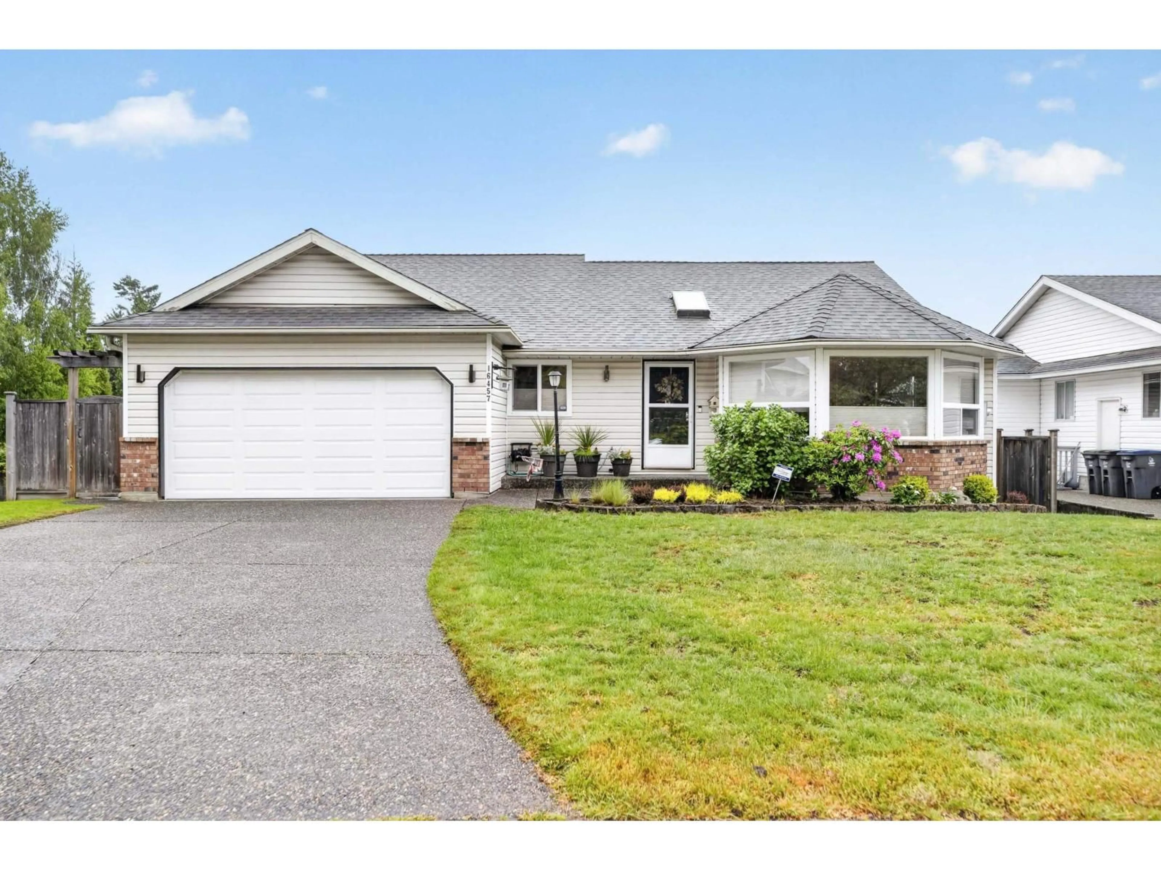 Home with vinyl exterior material, street for 16457 10A AVENUE, Surrey British Columbia V4A8R2