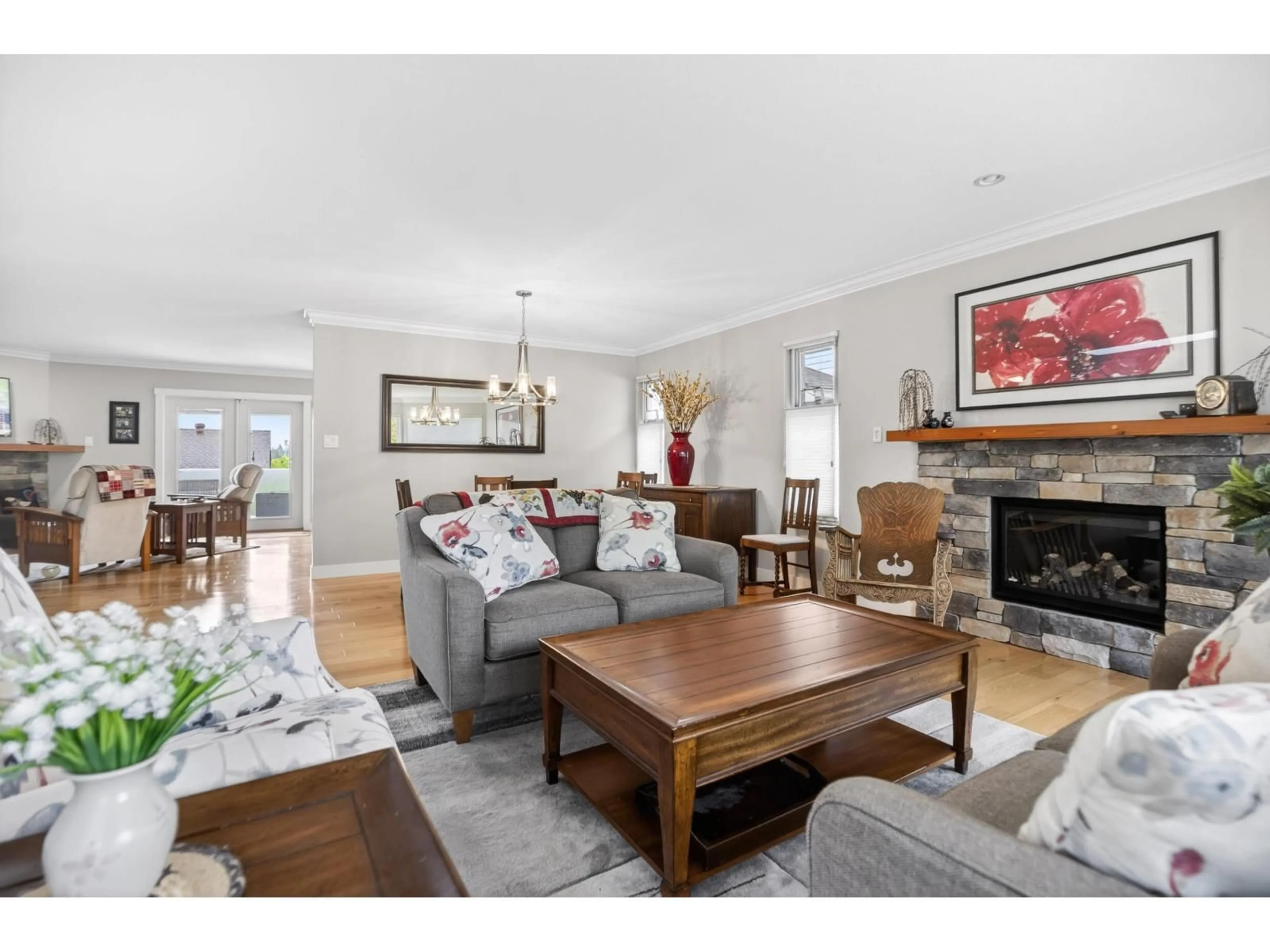 Living room with furniture, wood/laminate floor for 16457 10A AVENUE, Surrey British Columbia V4A8R2