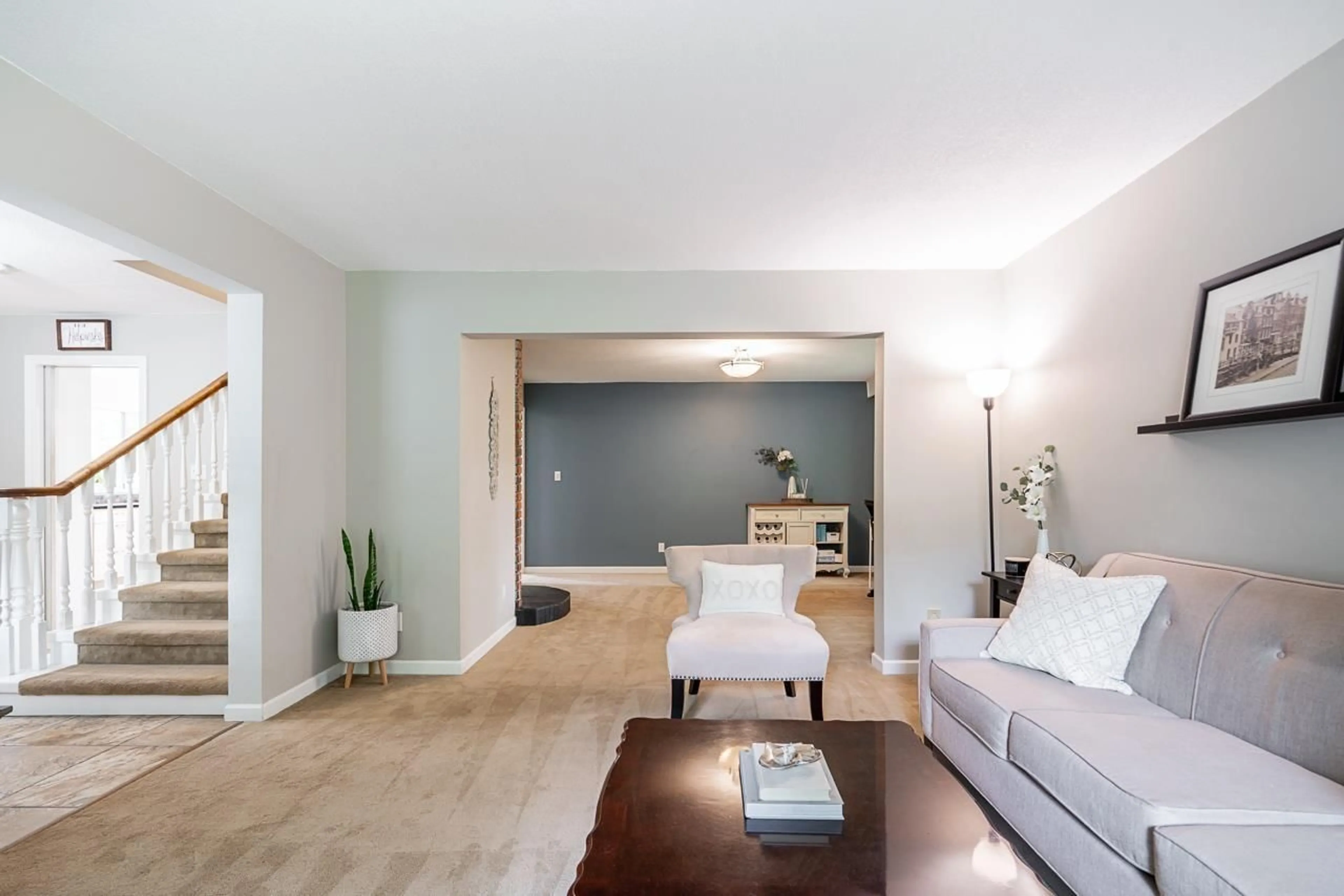 Living room with furniture, wood/laminate floor for 4687 248 STREET, Langley British Columbia V4W1C9