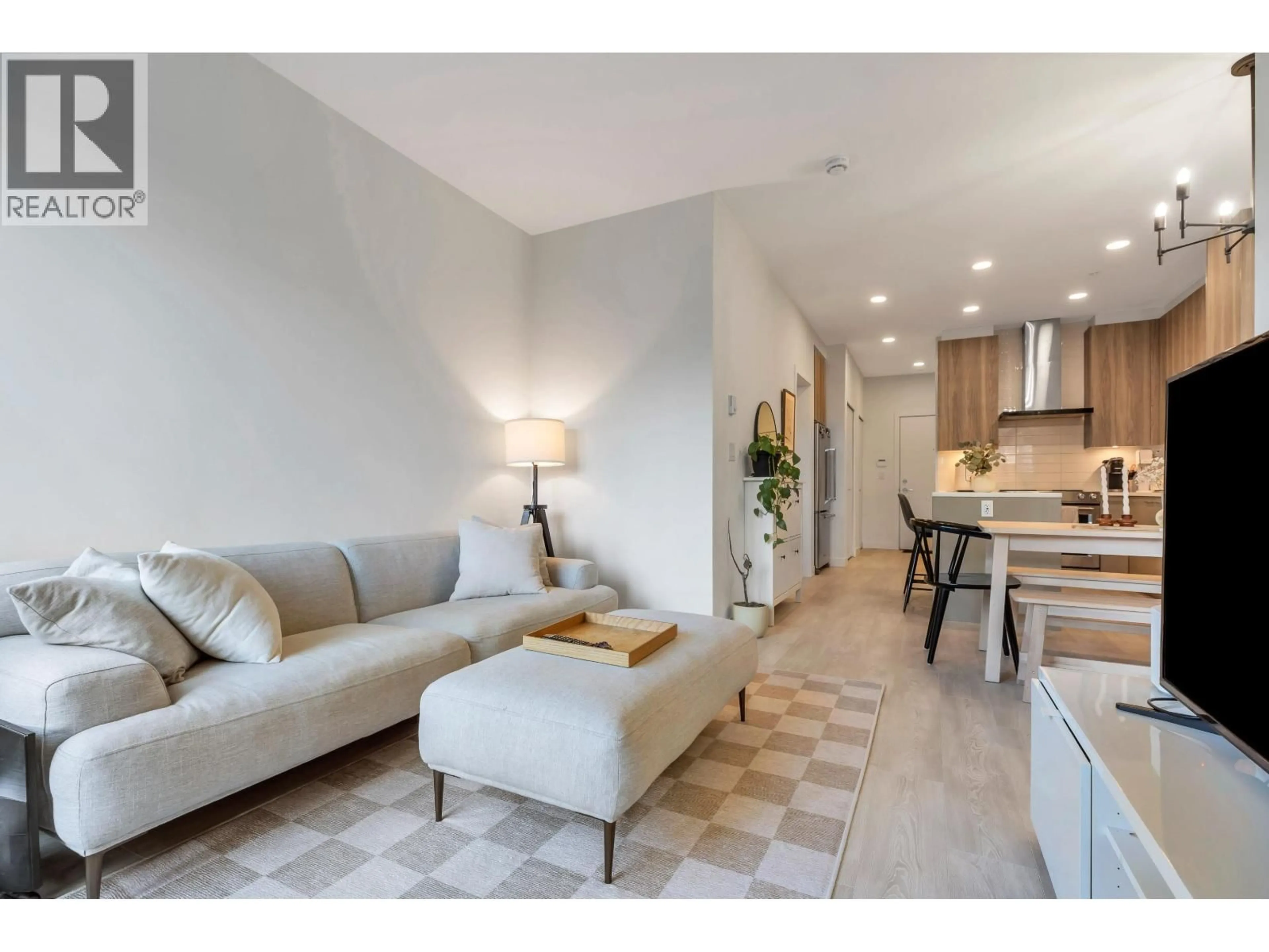 Living room with furniture, unknown for 106 - 7599 15TH STREET, Burnaby British Columbia V3N0H9