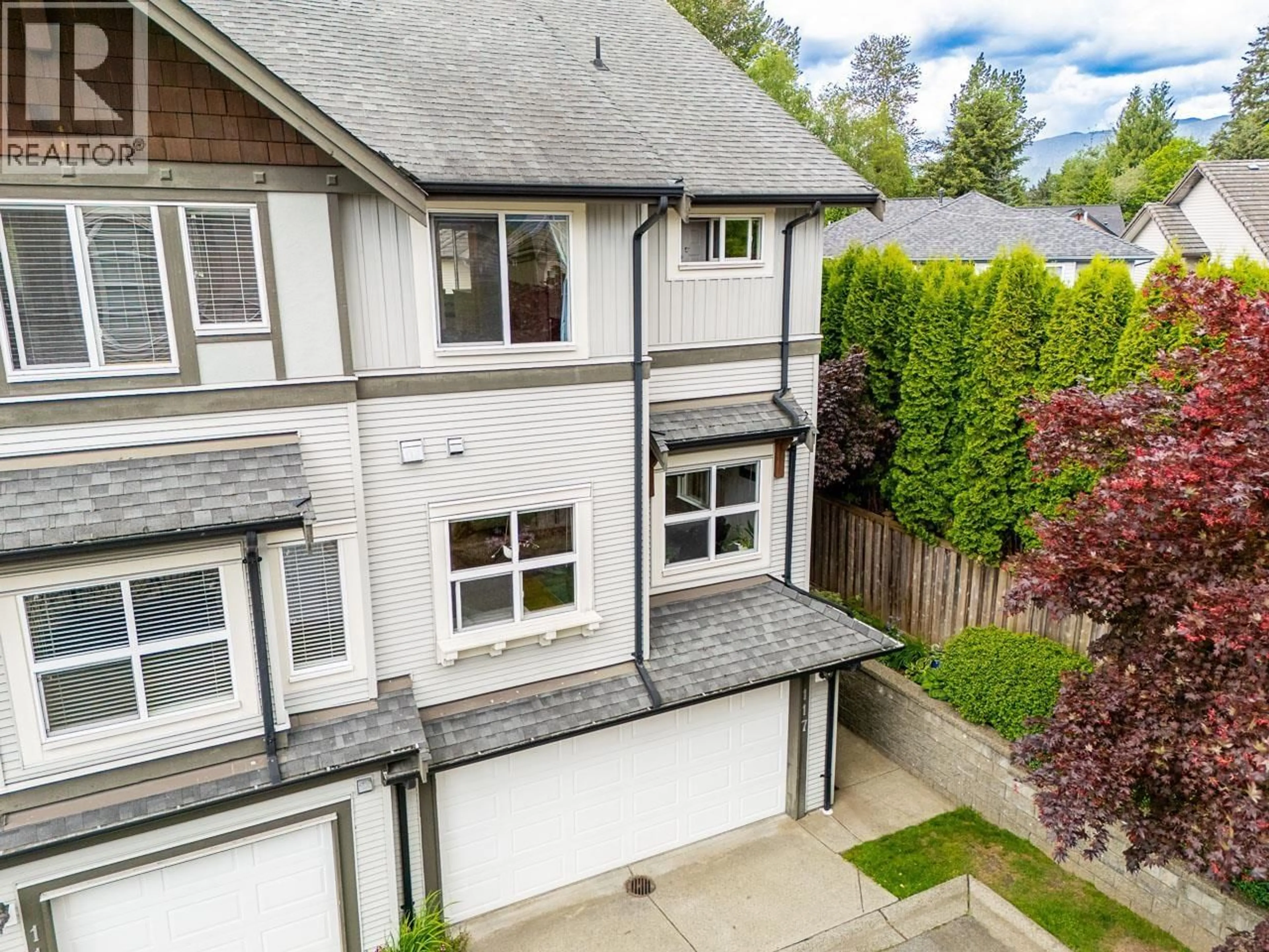 A pic from outside/outdoor area/front of a property/back of a property/a pic from drone, street for 117 - 1055 RIVERWOOD GATE, Port Coquitlam British Columbia V3B8C3