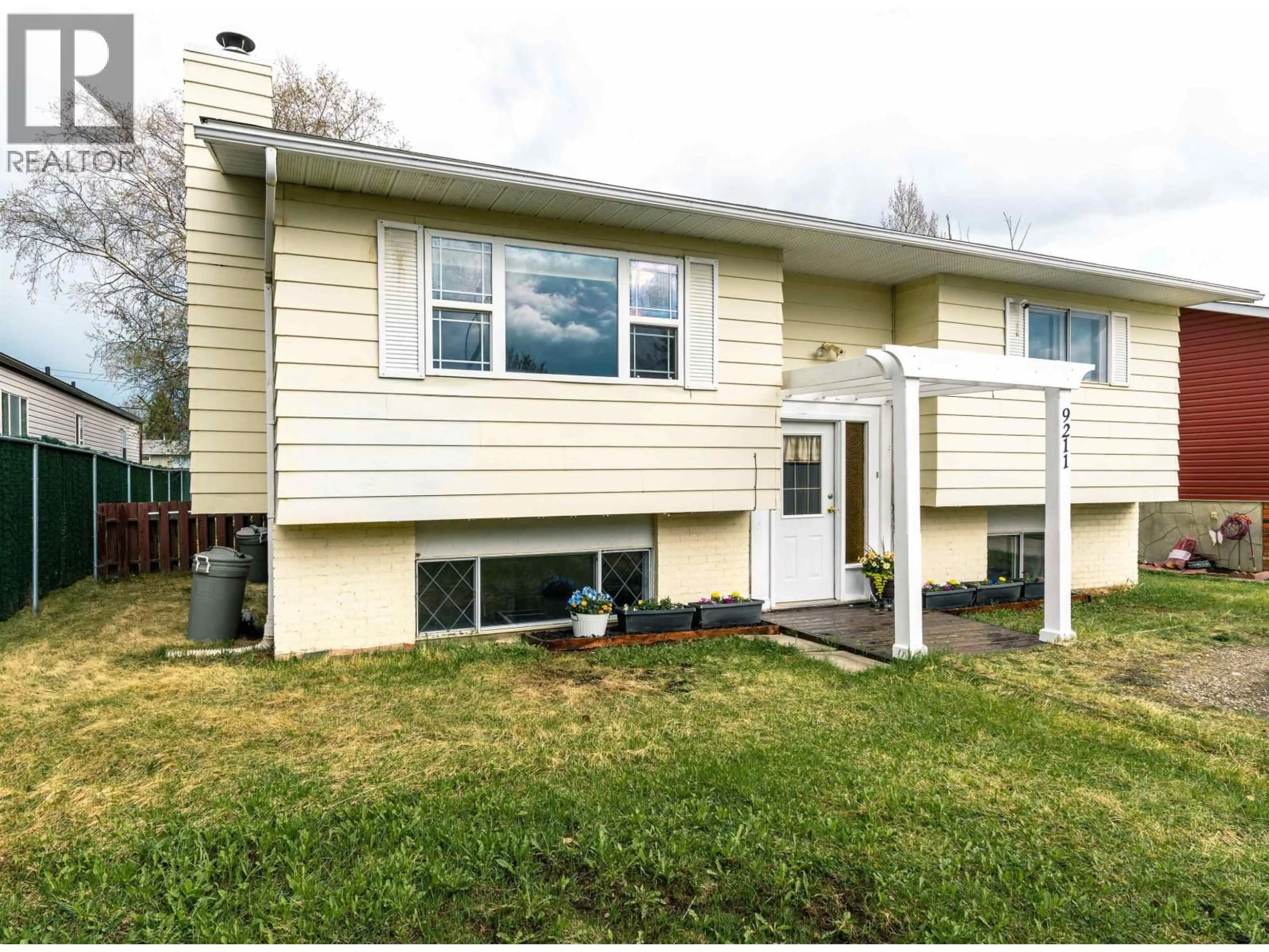Home with vinyl exterior material, street for 9211 77 STREET, Fort St. John British Columbia V1J3A8