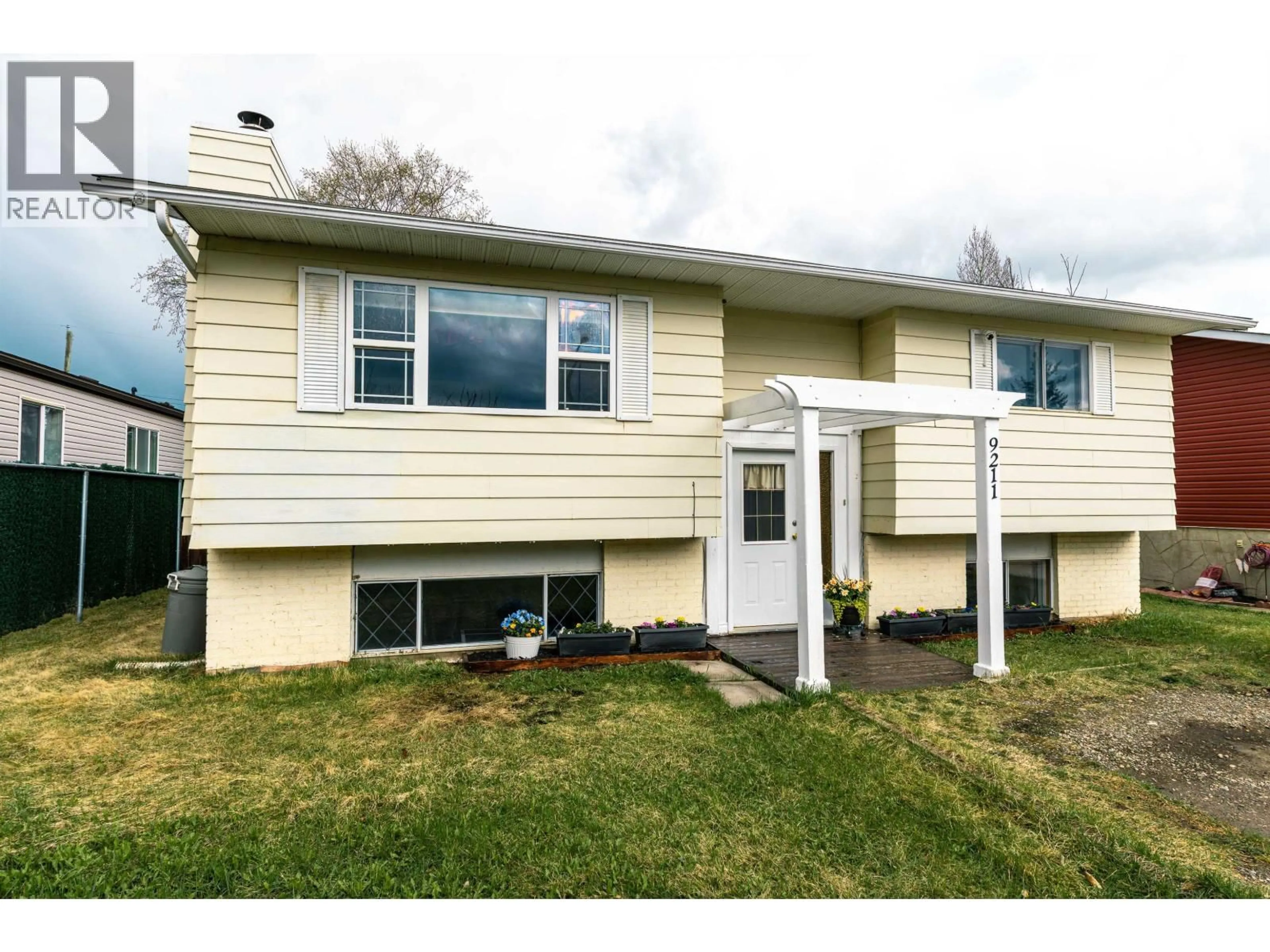 Home with vinyl exterior material, street for 9211 77 STREET, Fort St. John British Columbia V1J3A8