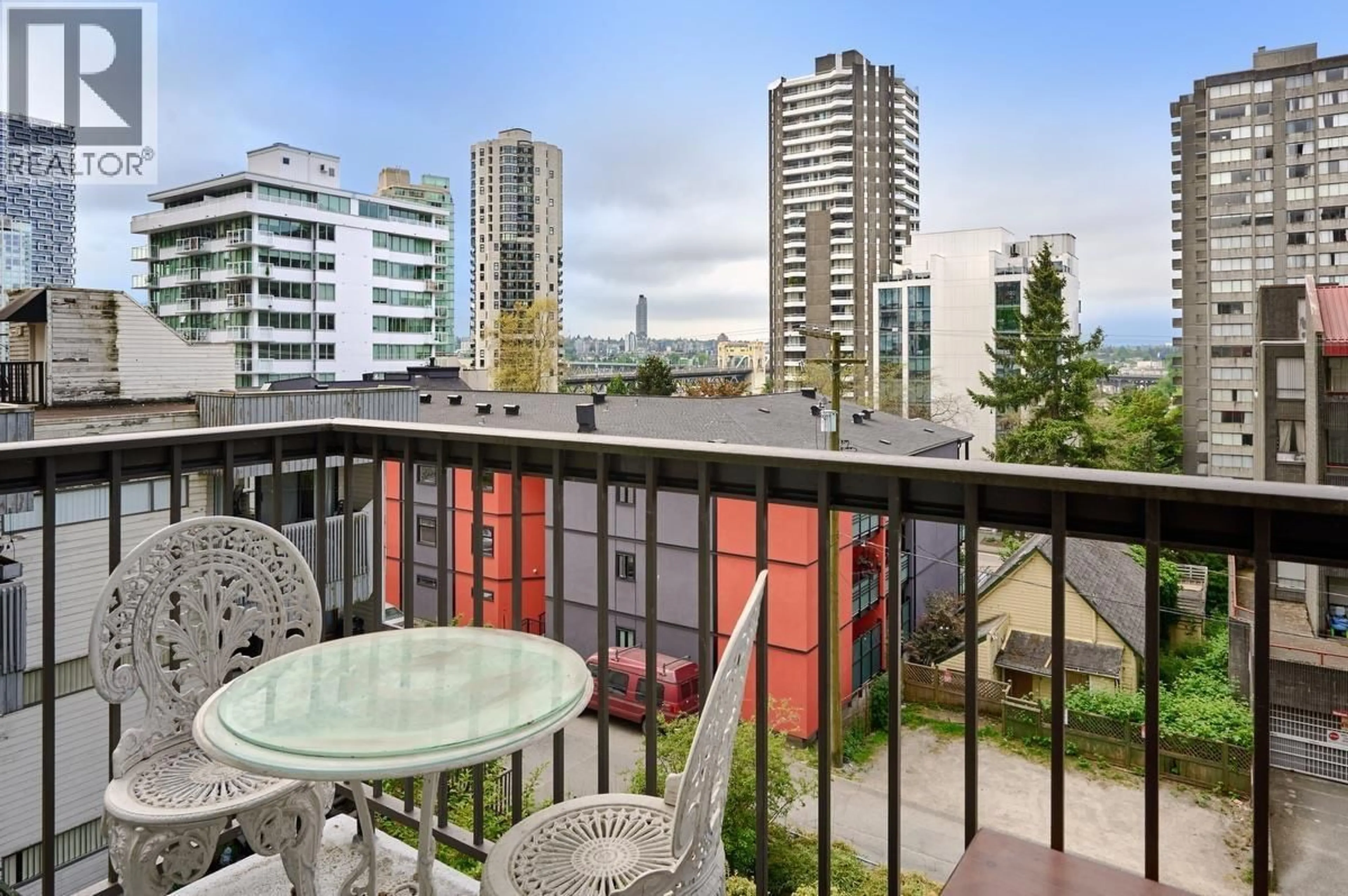 Balcony in the apartment, city buildings view from balcony for 307 - 1146 HARWOOD STREET, Vancouver British Columbia V6E3V1