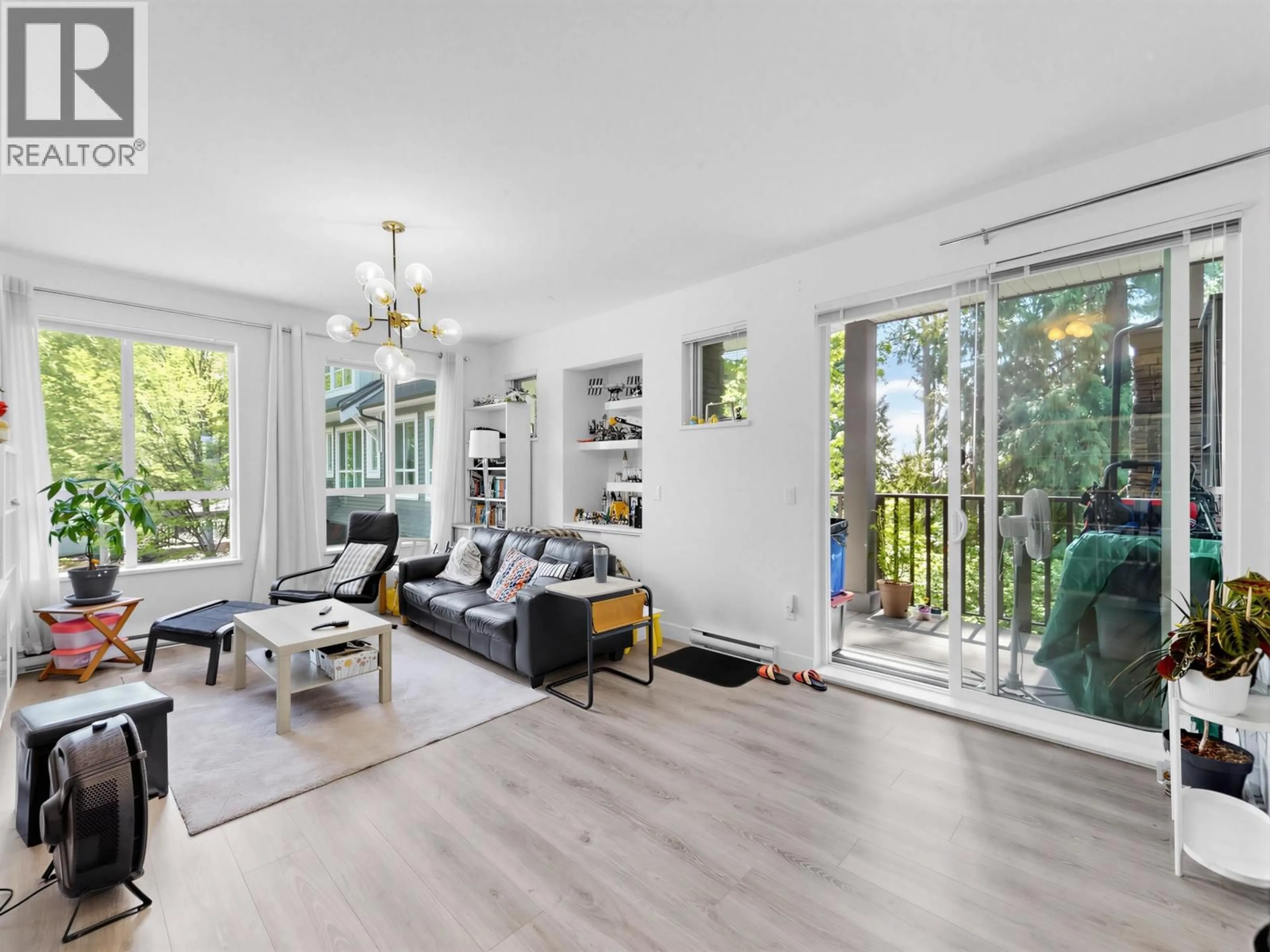 Living room with furniture, wood/laminate floor for 121 - 1480 SOUTHVIEW STREET, Coquitlam British Columbia V3E0G5