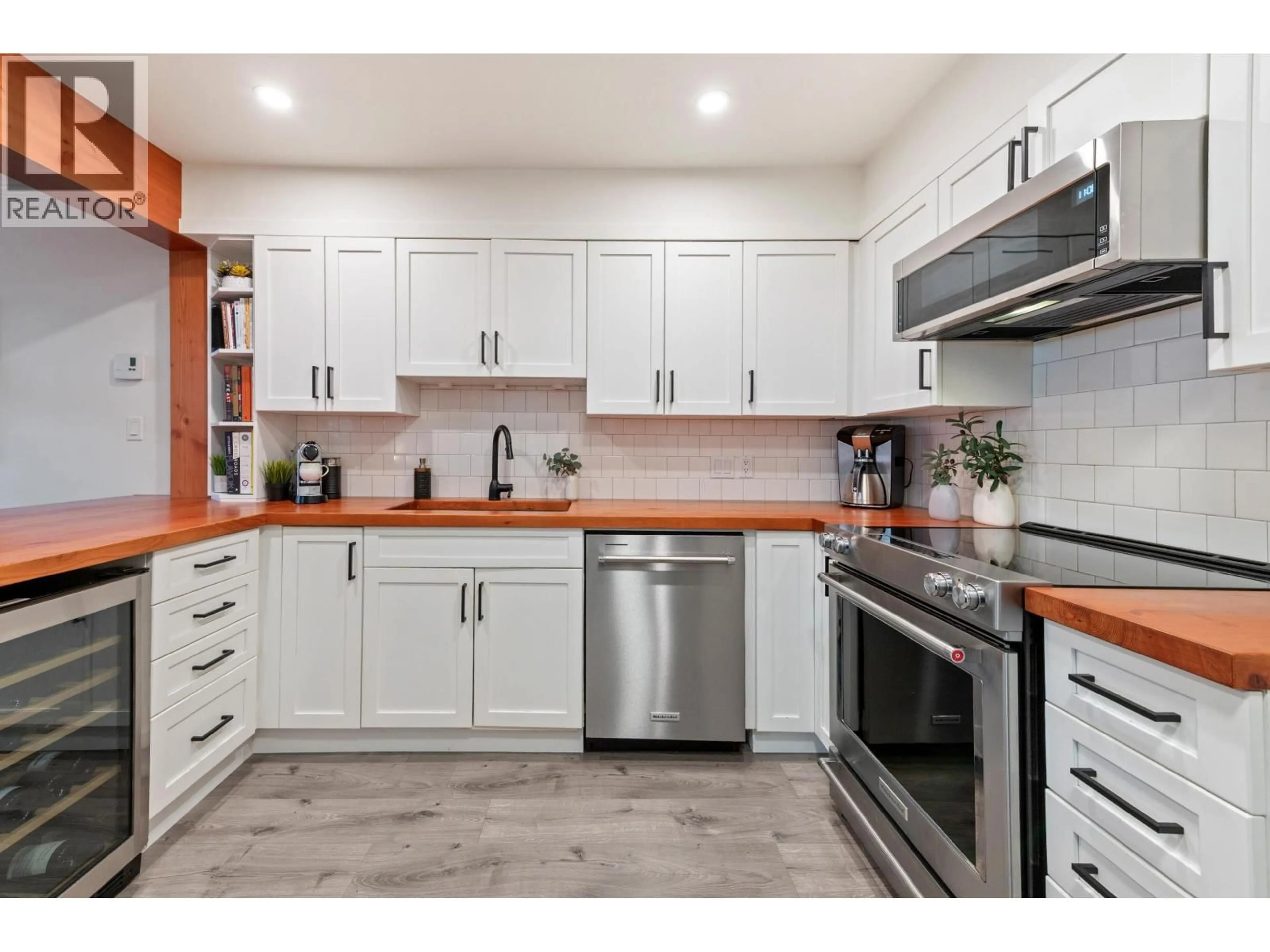 Open concept kitchen, ceramic/tile floor for 102 - 1055 13TH AVENUE, Vancouver British Columbia V6H1N1