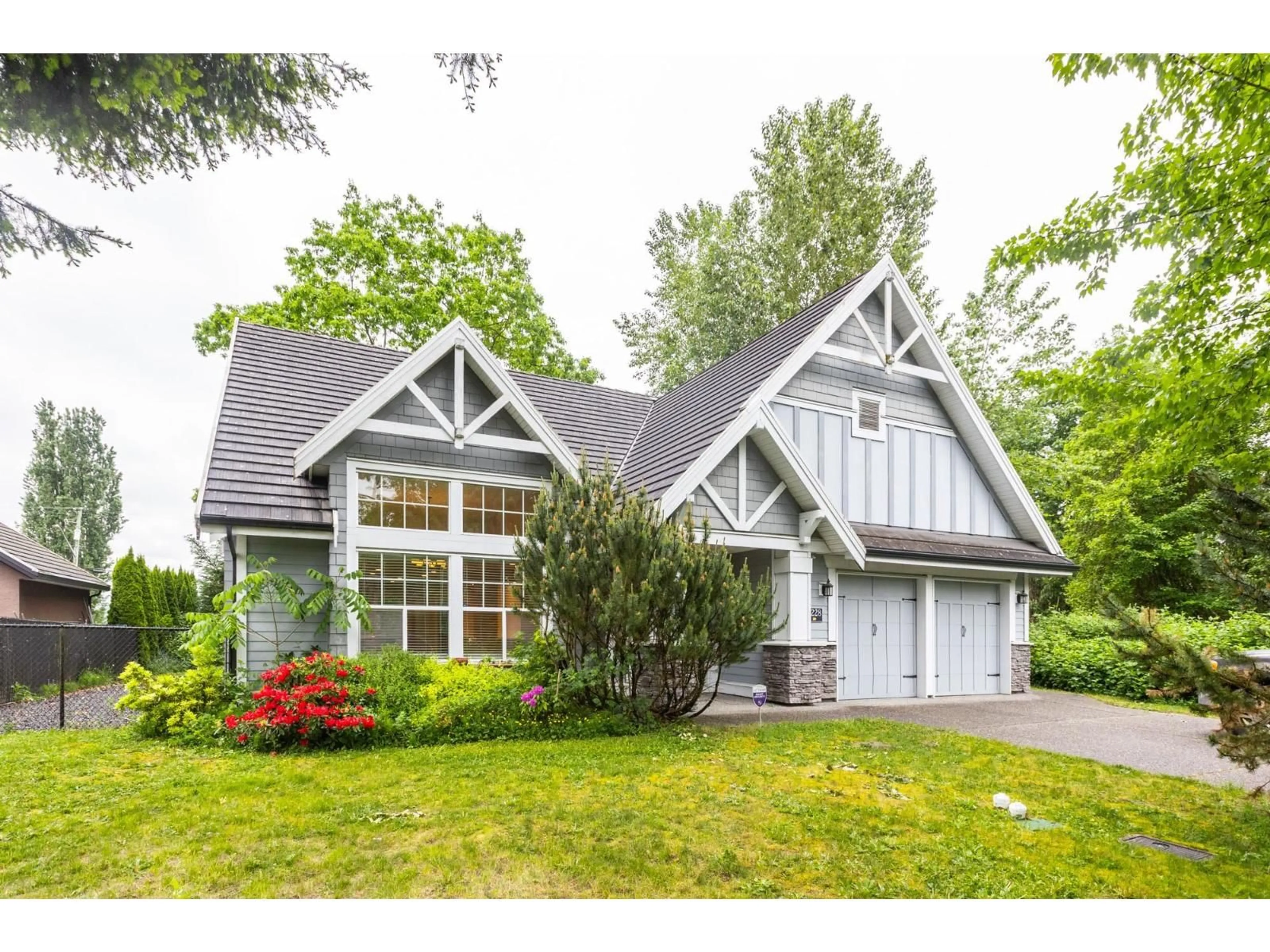 Home with vinyl exterior material, street for 8228 171A STREET, Surrey British Columbia V4N0B2