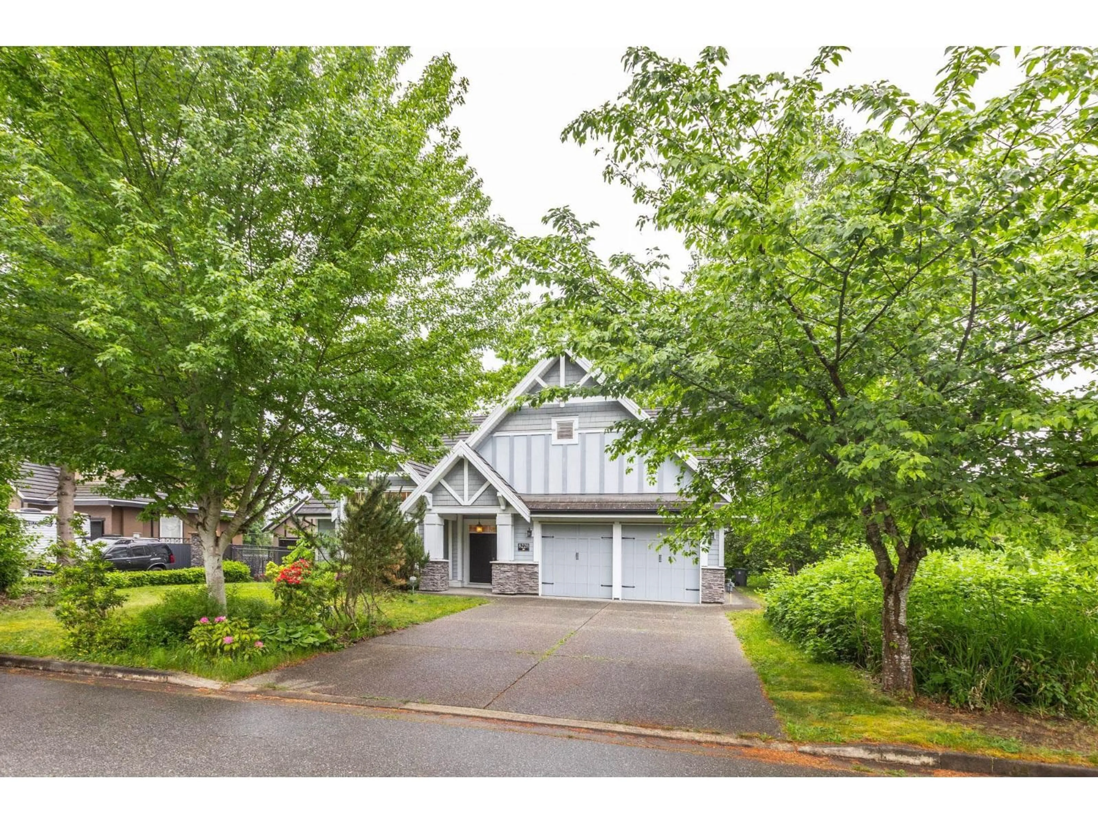 Home with vinyl exterior material, street for 8228 171A STREET, Surrey British Columbia V4N0B2