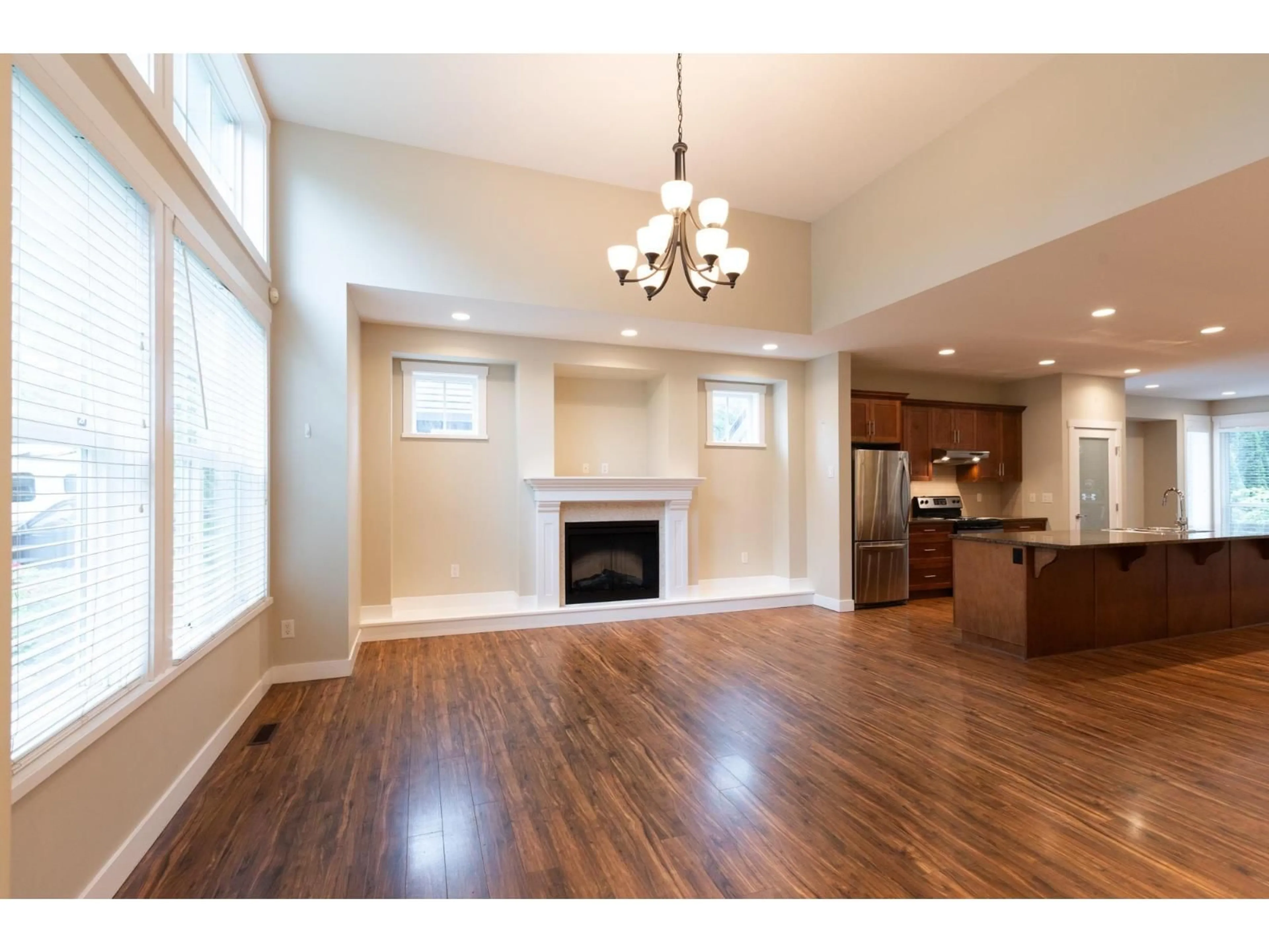 Open concept kitchen, wood/laminate floor for 8228 171A STREET, Surrey British Columbia V4N0B2