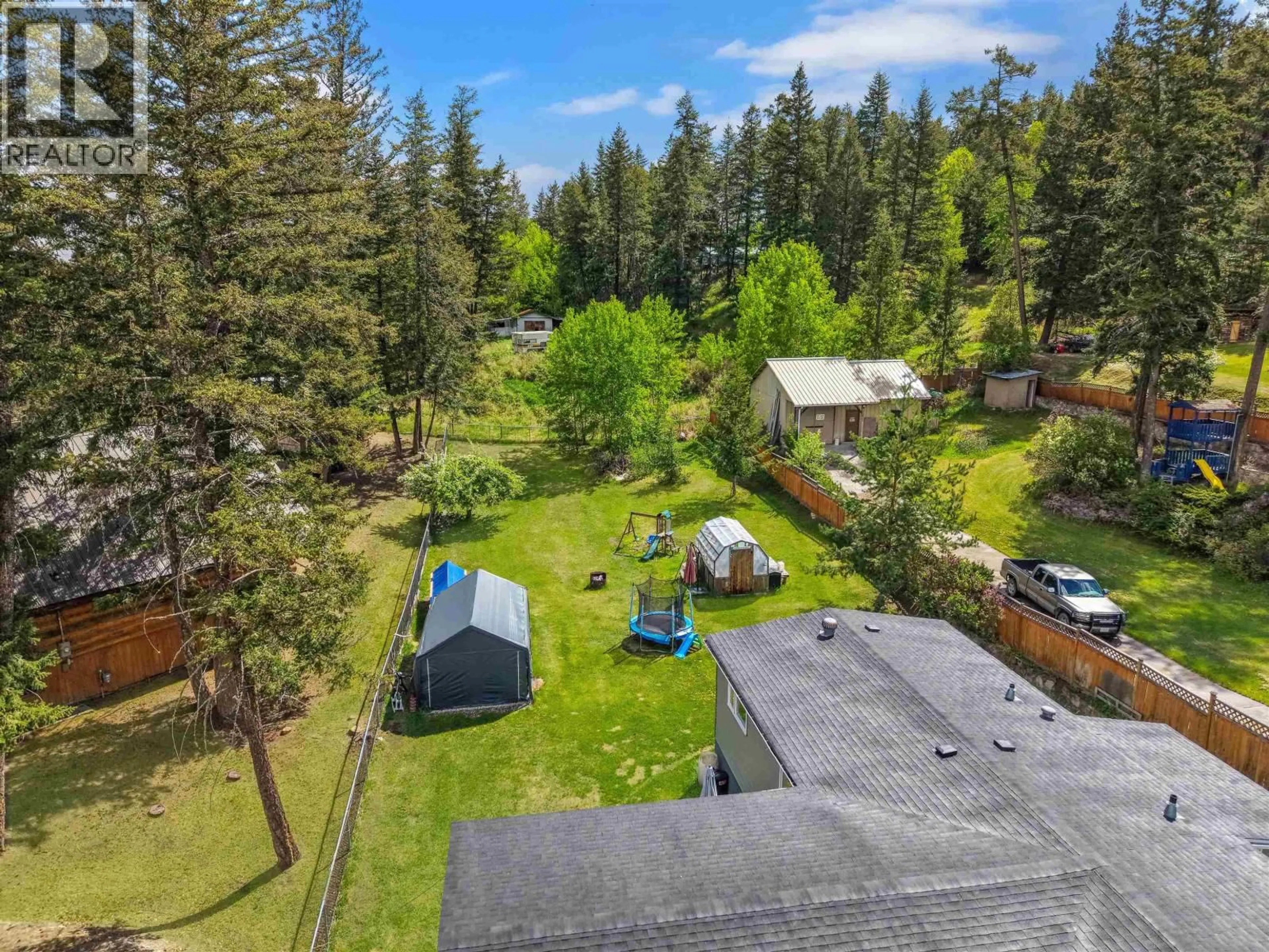 A pic from outside/outdoor area/front of a property/back of a property/a pic from drone, forest/trees view for 1008 RICHARD ROAD, Williams Lake British Columbia V2G3M1
