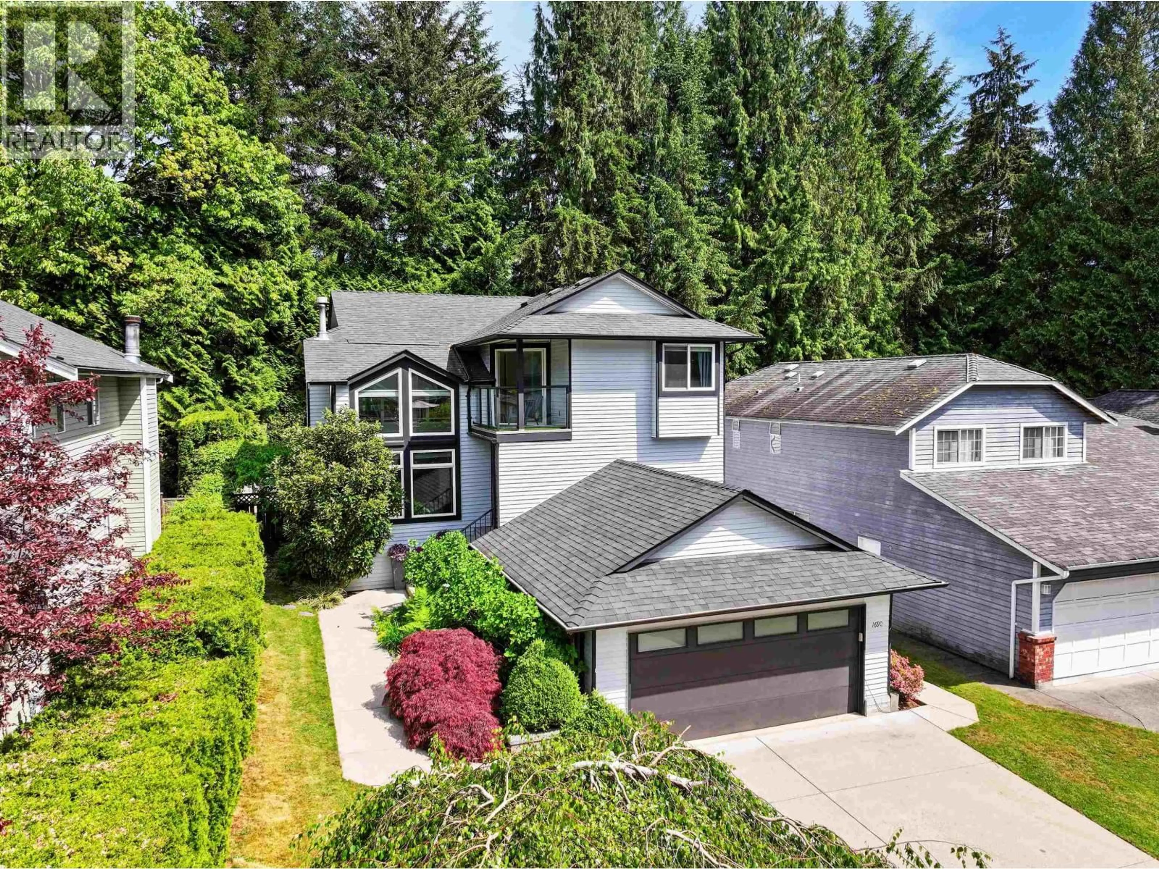 Home with vinyl exterior material, street for 1690 CASCADE COURT, North Vancouver British Columbia V7G2H6