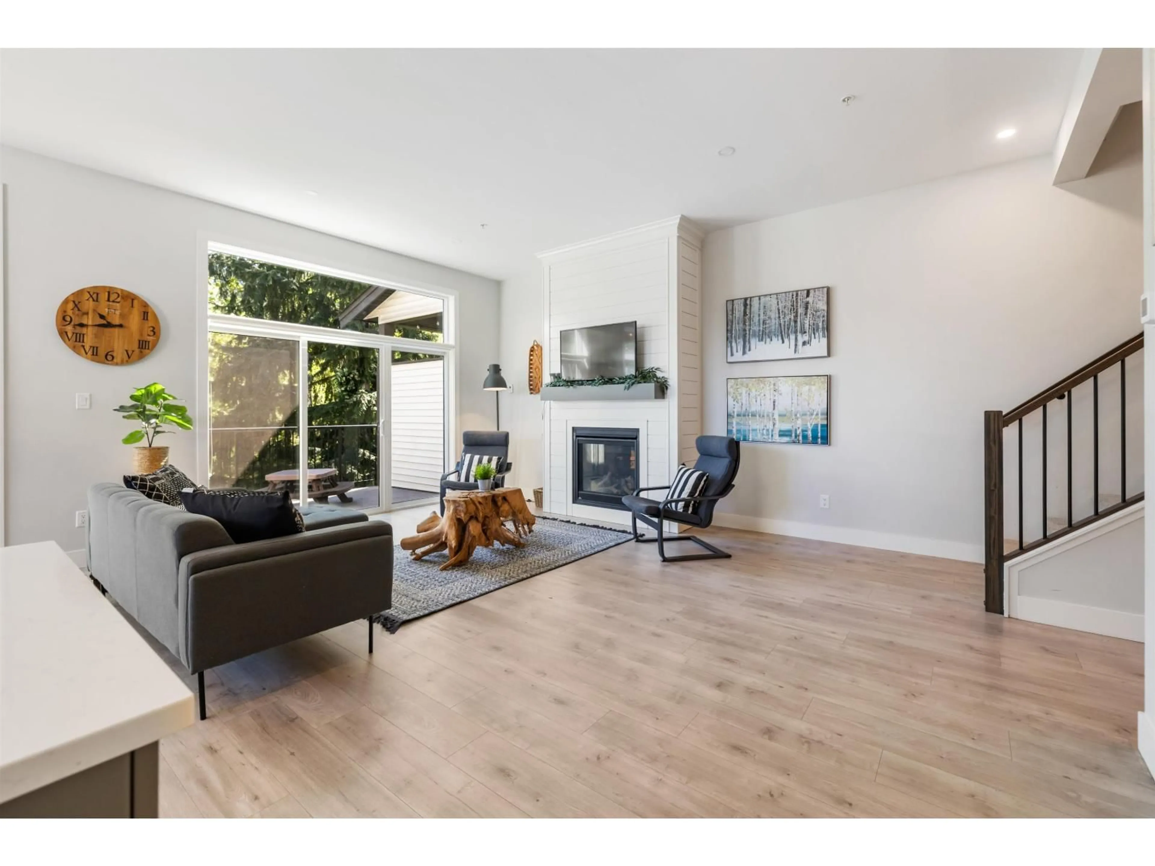 Living room with furniture, wood/laminate floor for A - 50249 LUNA PLACE, Chilliwack British Columbia V4Z0E1