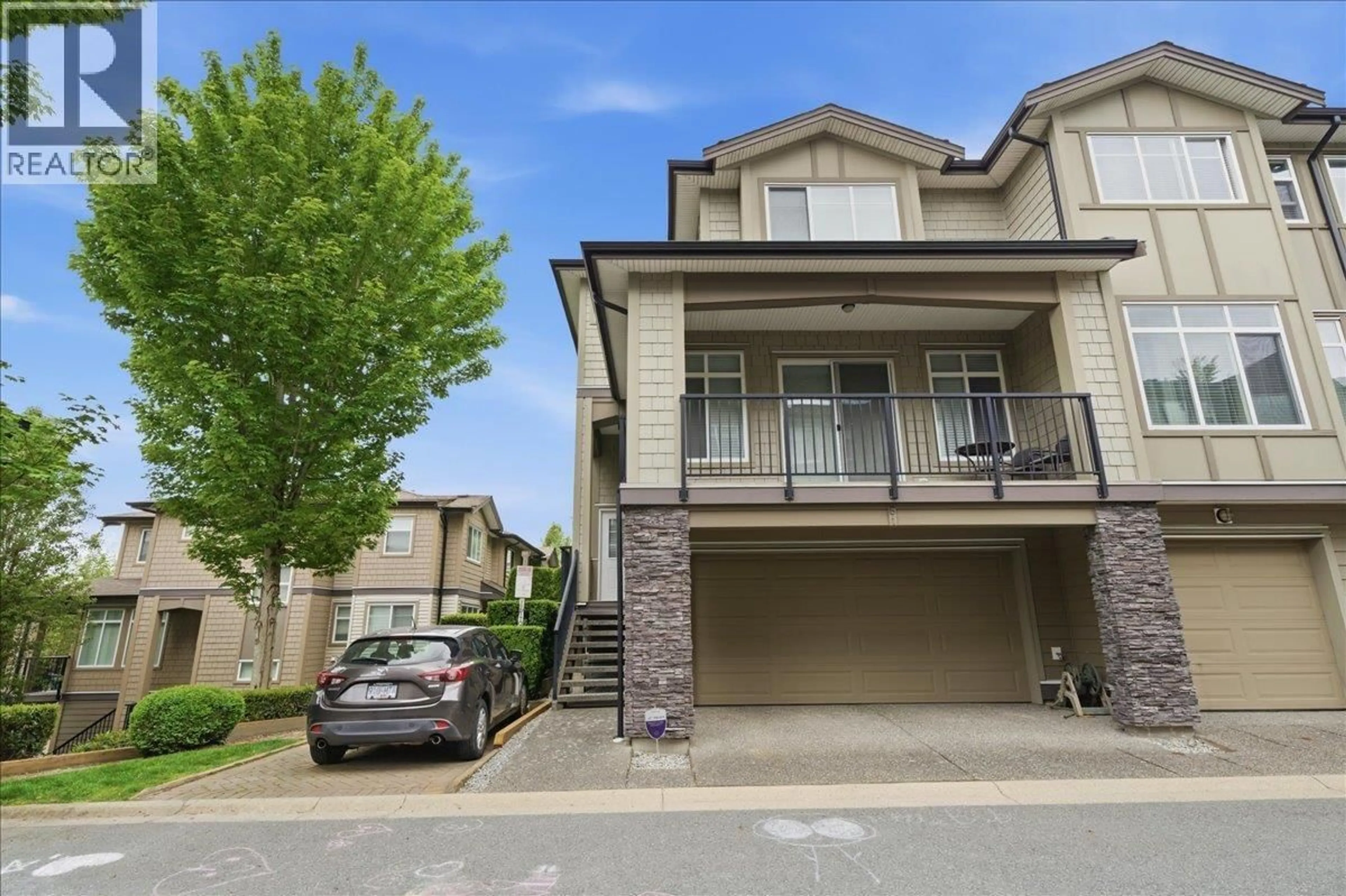 A pic from outside/outdoor area/front of a property/back of a property/a pic from drone, street for 61 - 22865 TELOSKY AVENUE, Maple Ridge British Columbia V2X8Z9