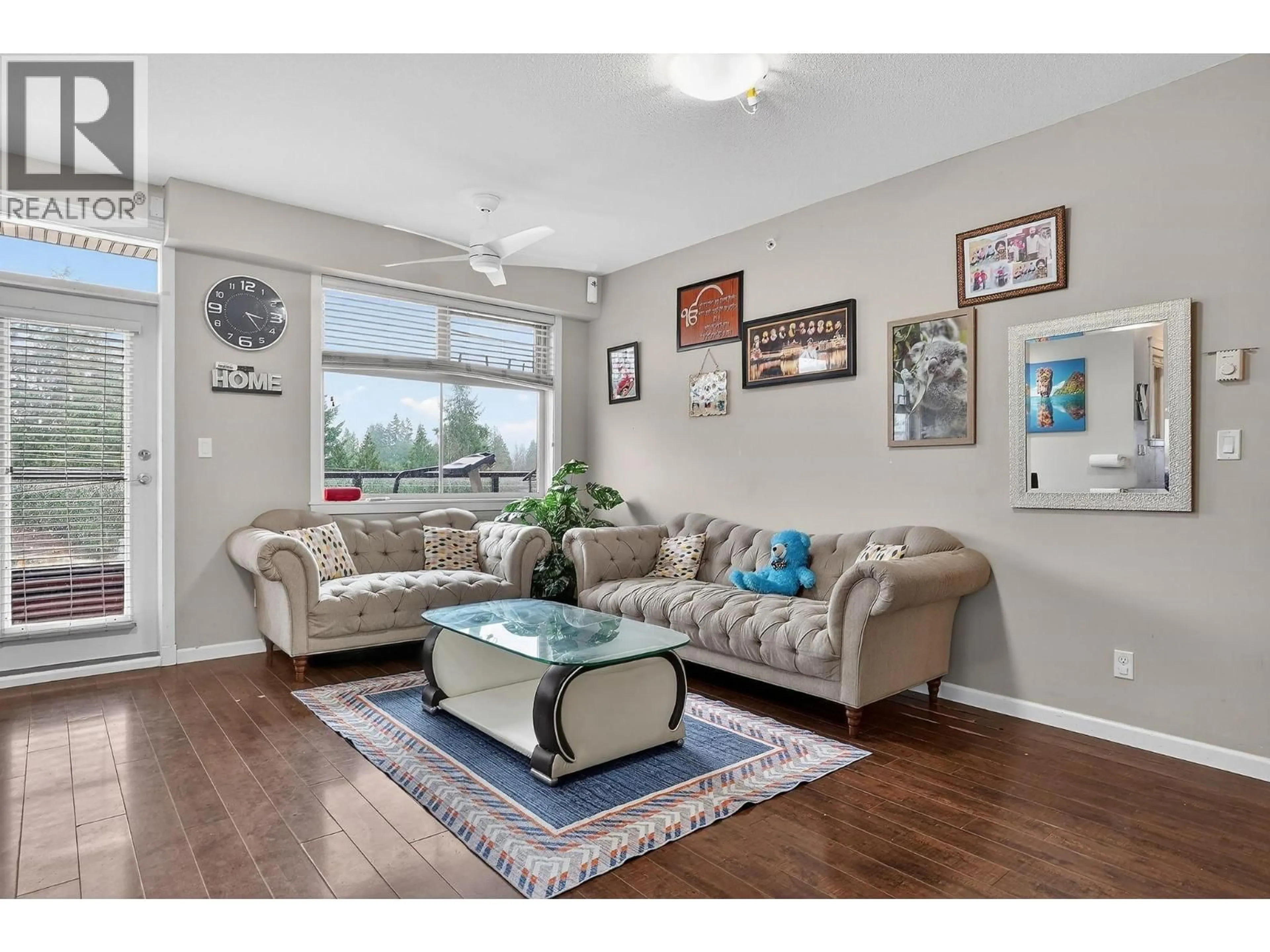 Living room with furniture, wood/laminate floor for 404 - 22858 LOUGHEED HIGHWAY, Maple Ridge British Columbia V2X2V6