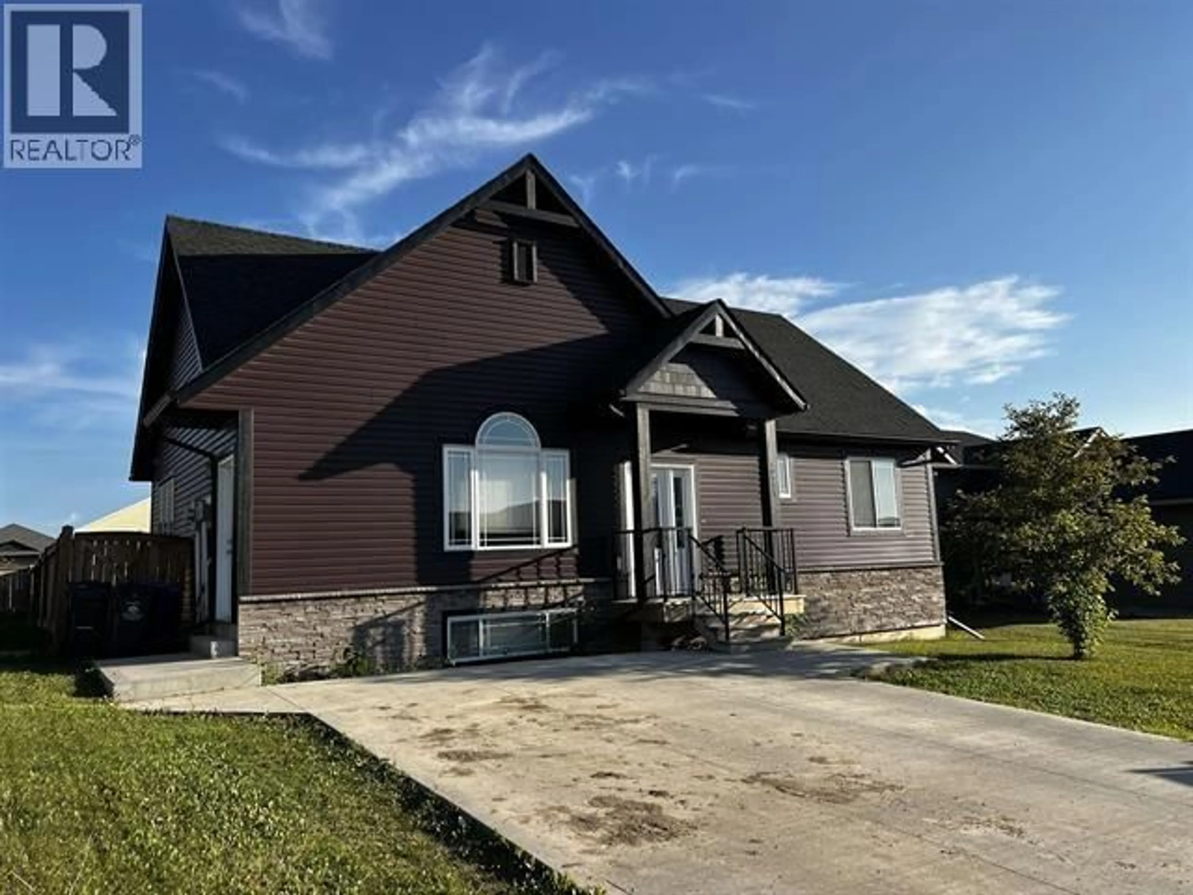 Home with brick exterior material, building for 10923 105 AVENUE, Fort St. John British Columbia V1J0L2
