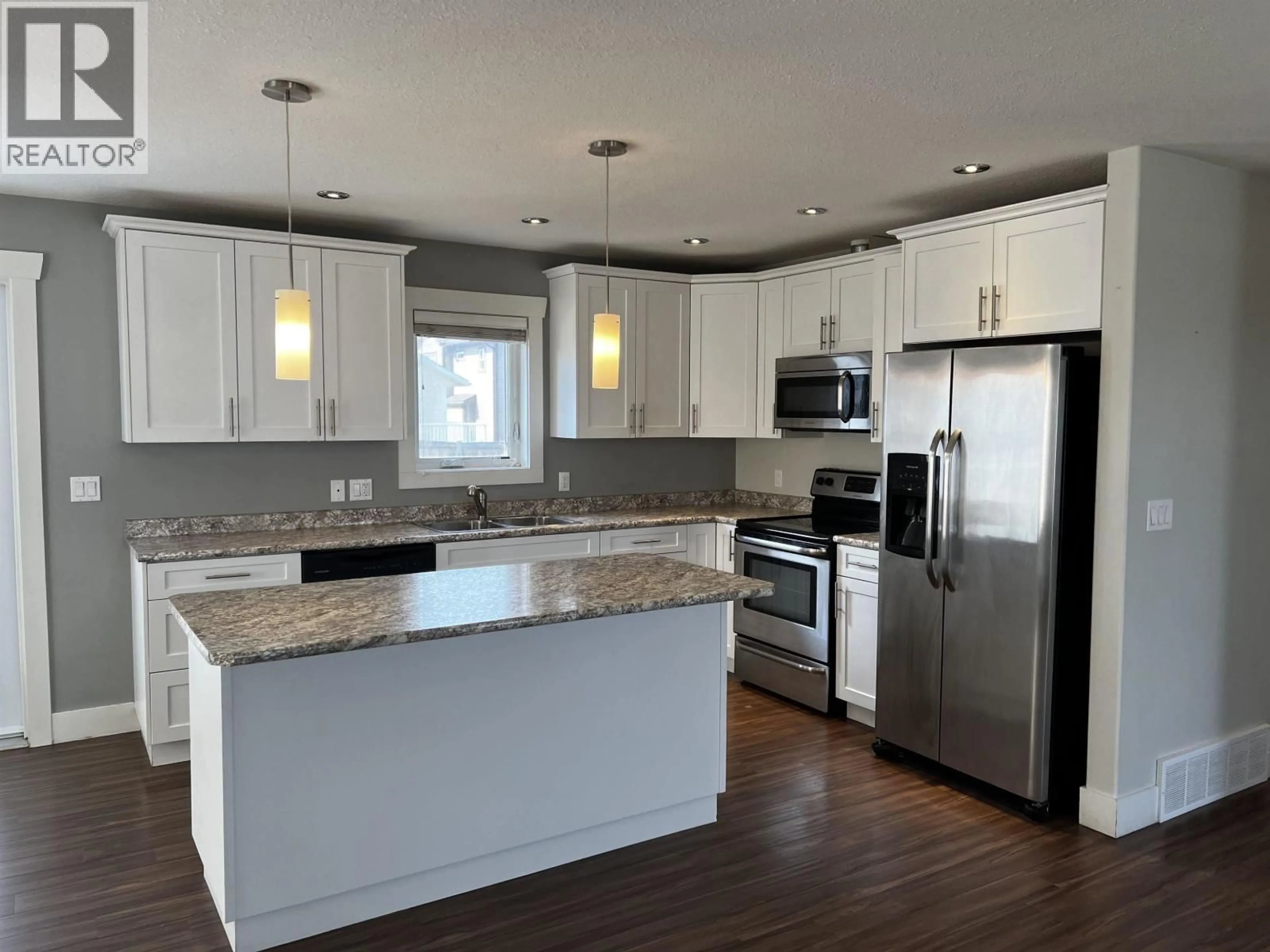 Open concept kitchen, unknown for 10923 105 AVENUE, Fort St. John British Columbia V1J0L2