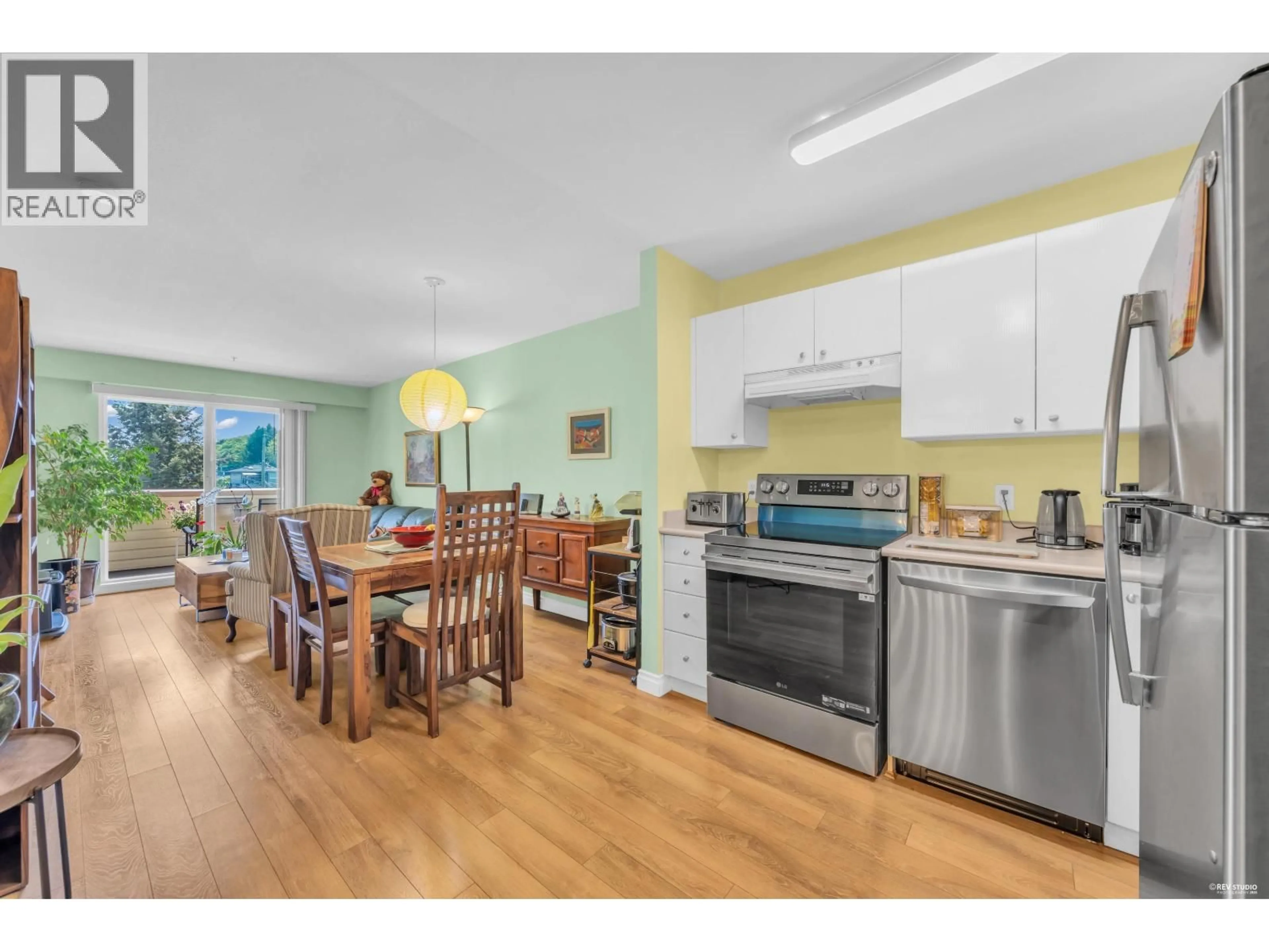Open concept kitchen, unknown for 202 - 3624 FRASER STREET, Vancouver British Columbia V5V4C8