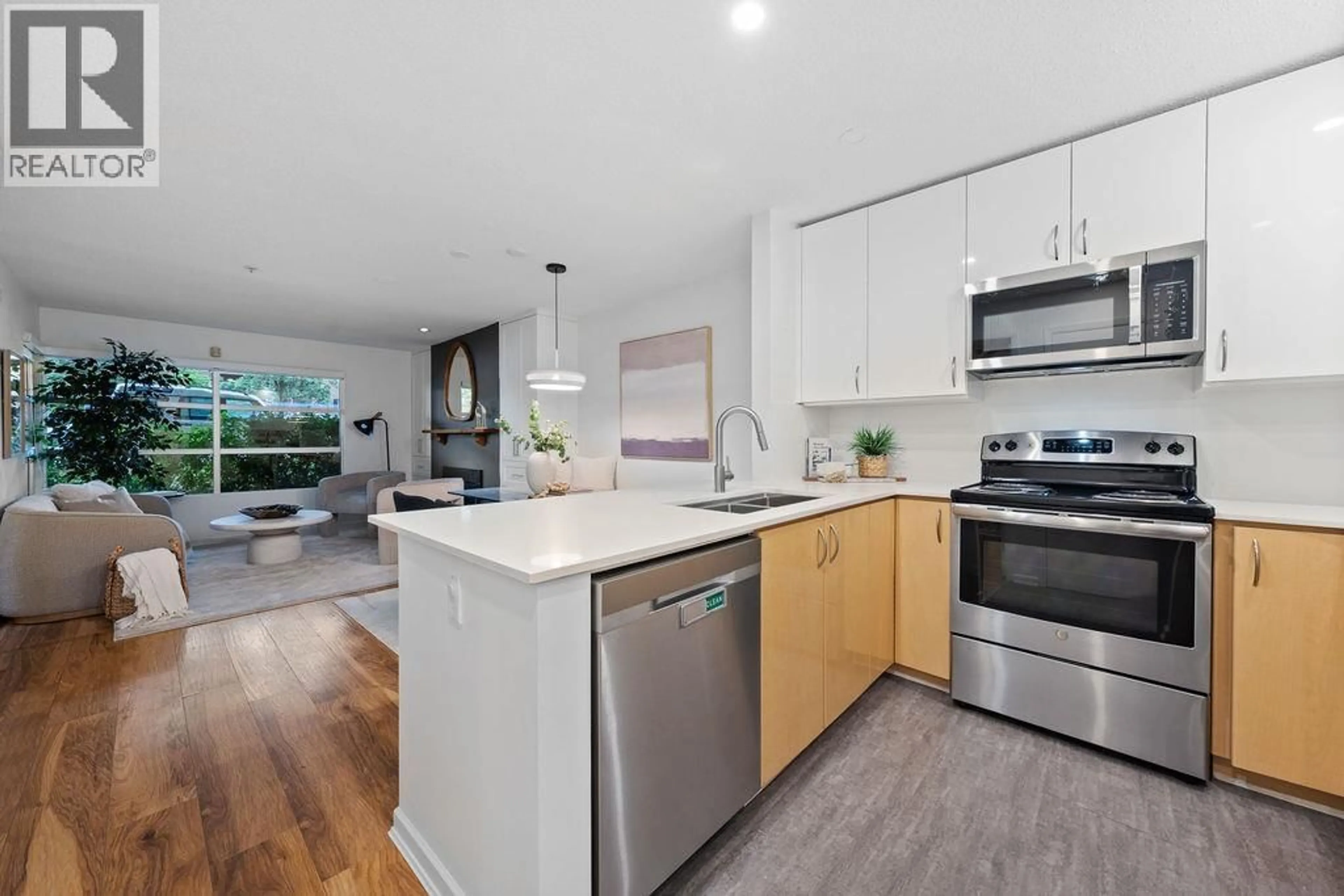 Open concept kitchen, unknown for 104 - 3023 W 4TH AVENUE, Vancouver British Columbia V6K1R5