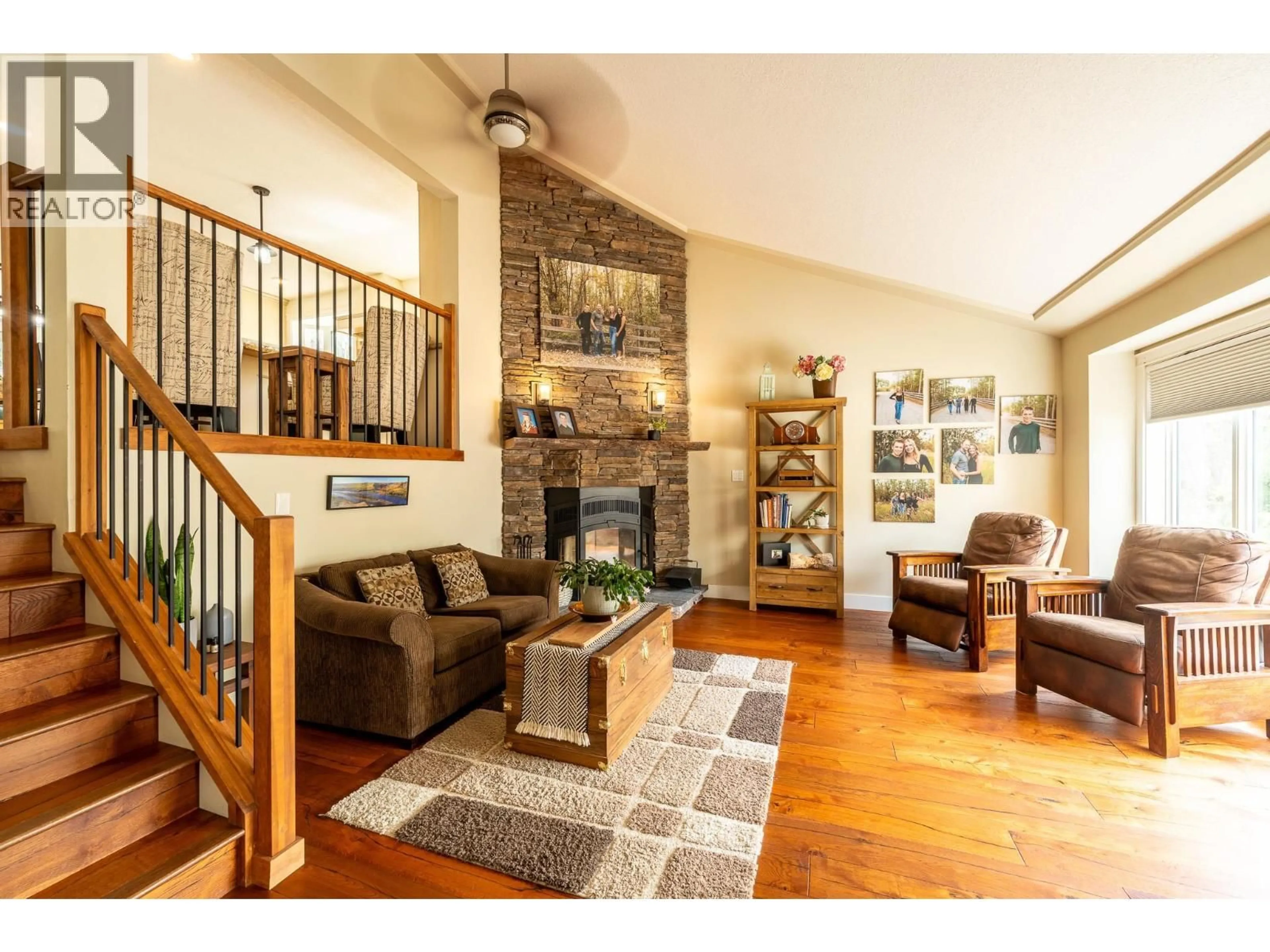 Living room with furniture, wood/laminate floor for 13066 WRIGHT ROAD, Charlie Lake British Columbia V0C1H0
