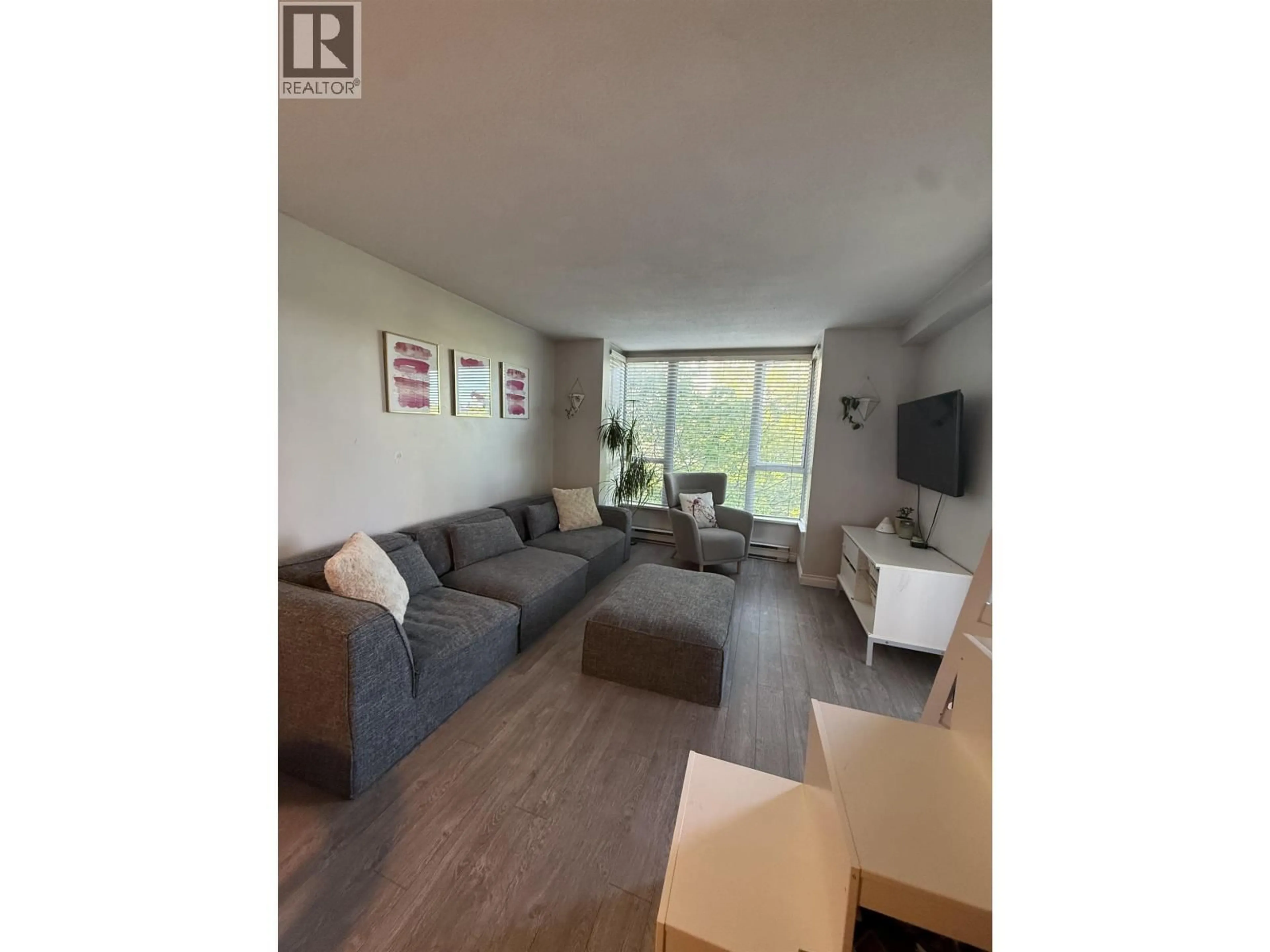 Living room with furniture, unknown for 303 - 5189 GASTON STREET, Vancouver British Columbia V5R6C7