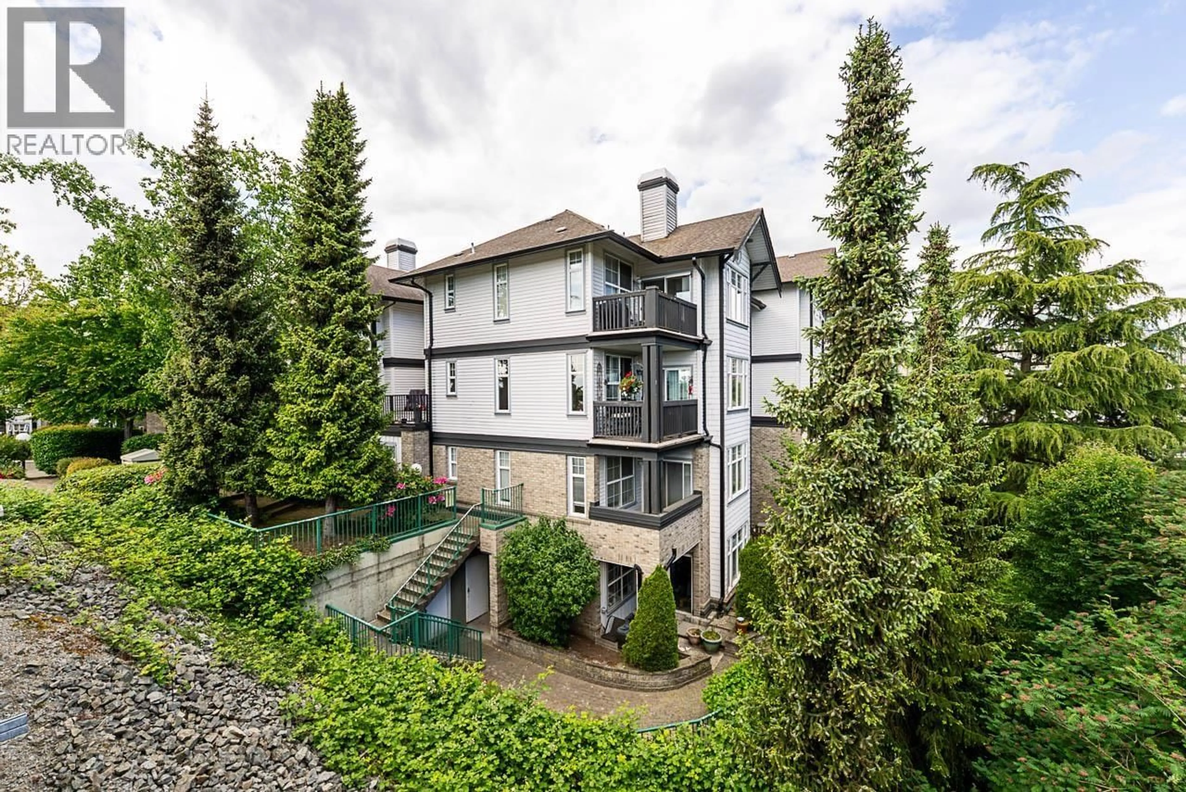 A pic from outside/outdoor area/front of a property/back of a property/a pic from drone, unknown for 202 - 83 STAR CRESCENT, New Westminster British Columbia V3M6X8