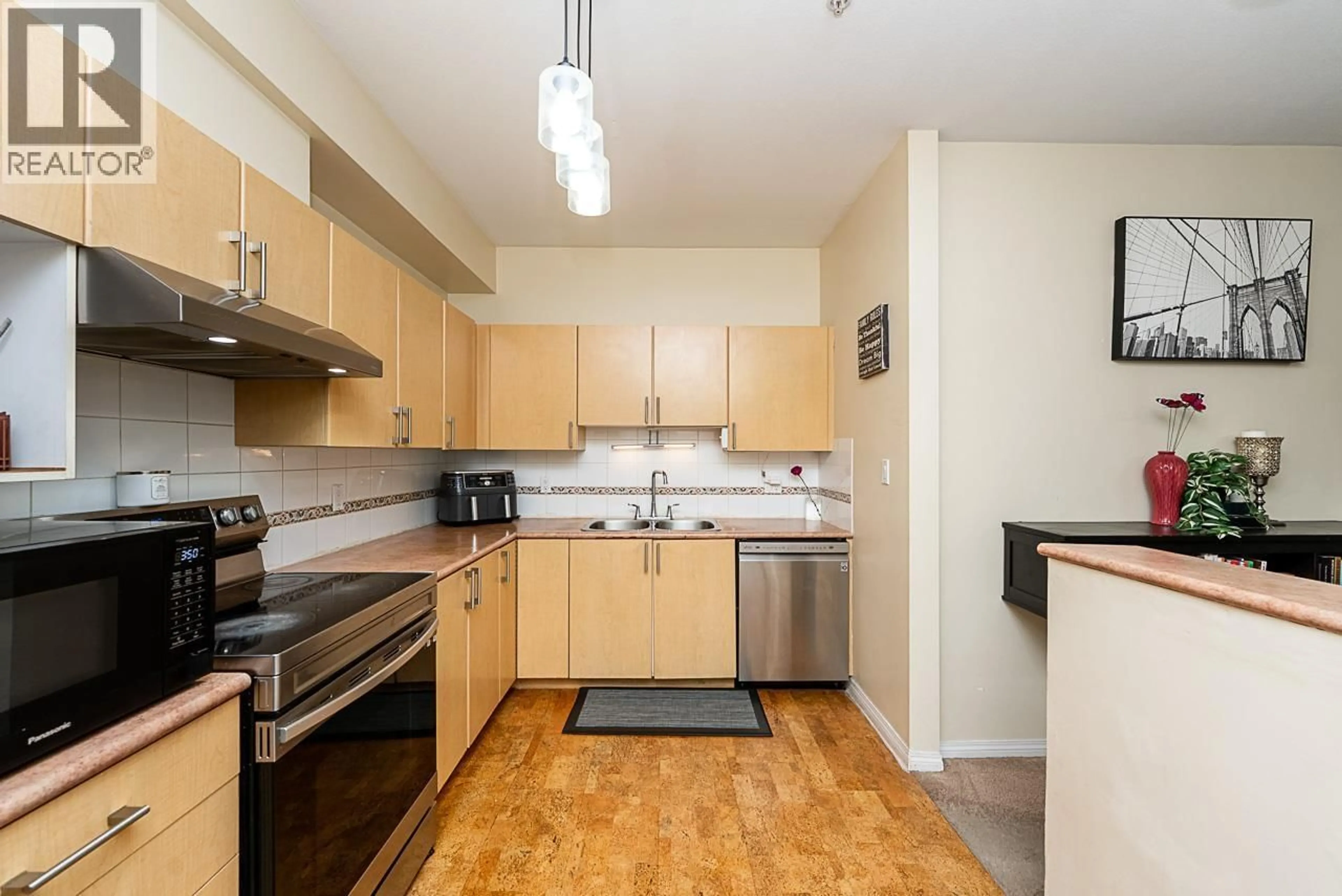 Standard kitchen, wood/laminate floor for 202 - 83 STAR CRESCENT, New Westminster British Columbia V3M6X8