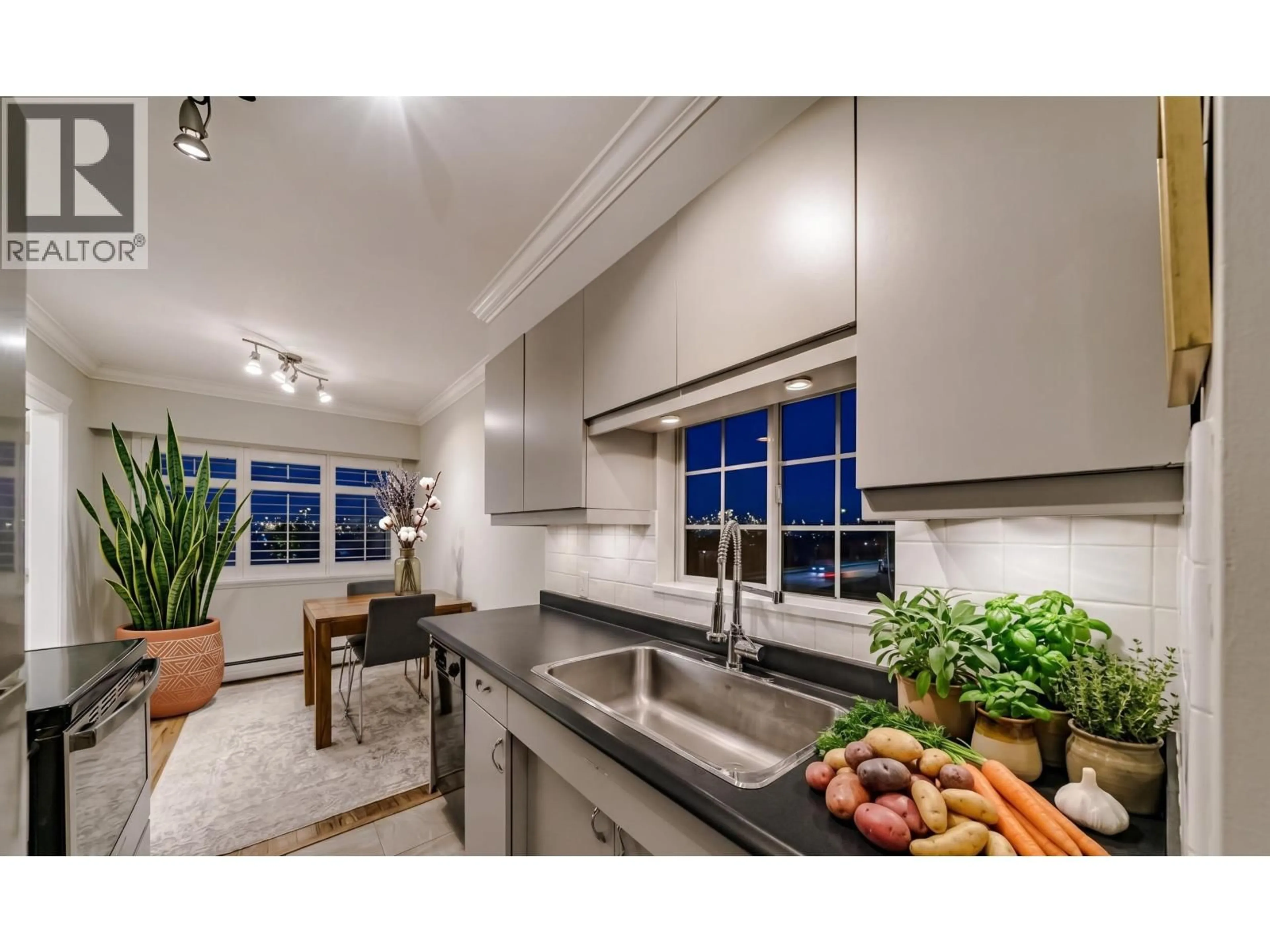Contemporary kitchen, ceramic/tile floor for 305 - 2430 POINT GREY ROAD, Vancouver British Columbia V6K1A2