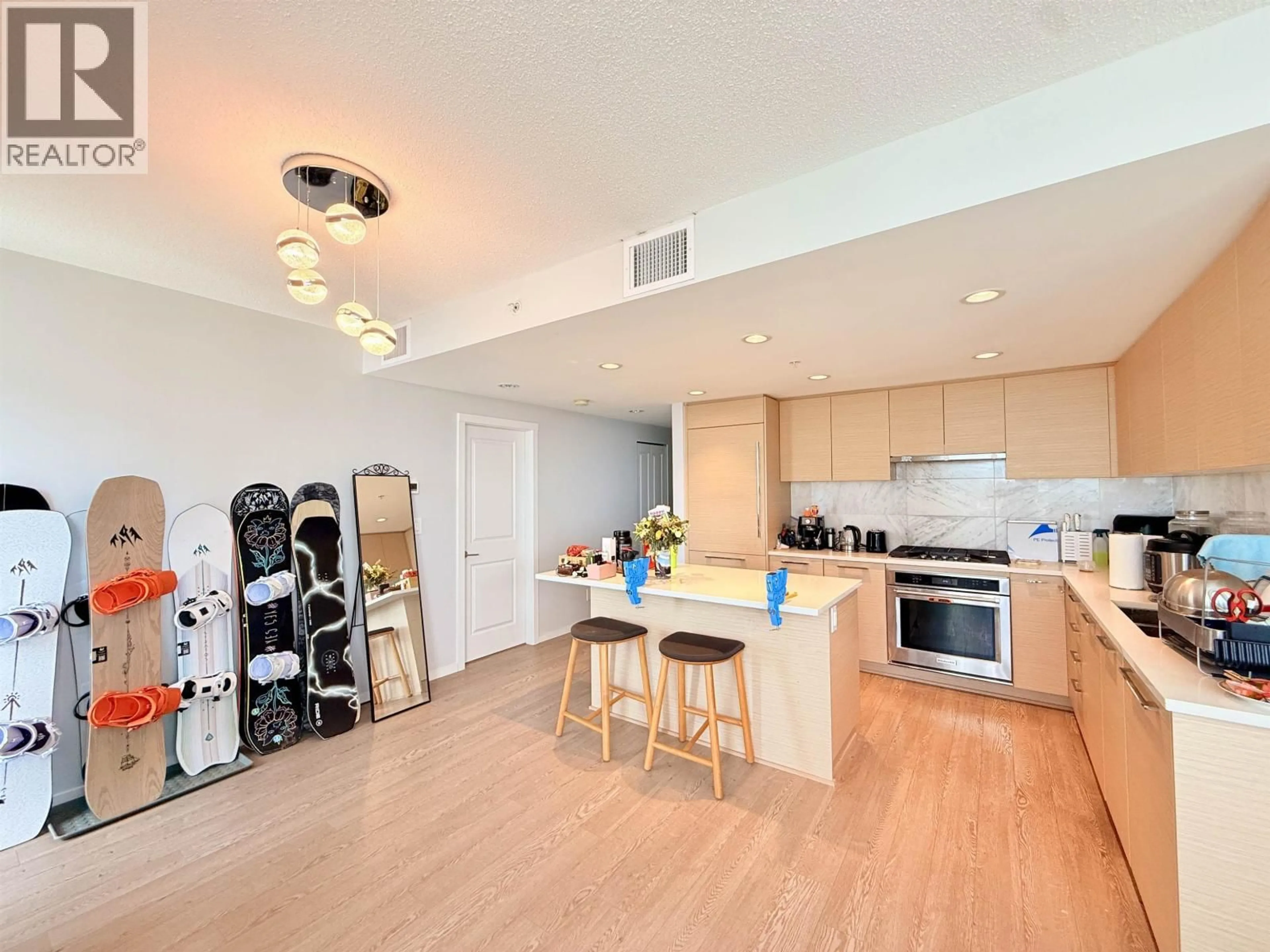 Open concept kitchen, wood/laminate floor for 2608 - 6700 DUNBLANE AVENUE, Burnaby British Columbia V5H0J3