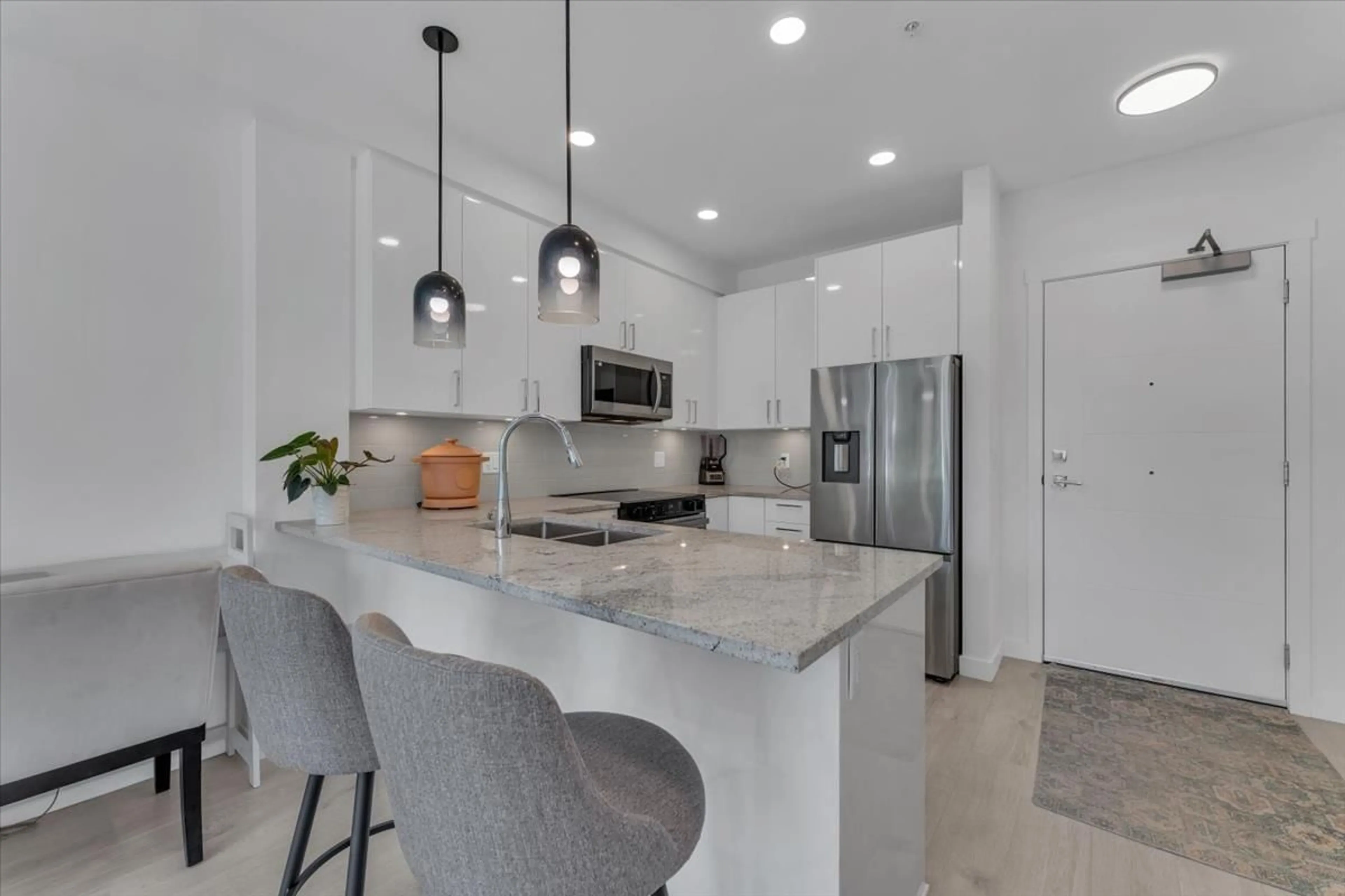 Open concept kitchen, ceramic/tile floor for 212 - 5504 BRYDON CRESCENT, Langley British Columbia V3A0R3