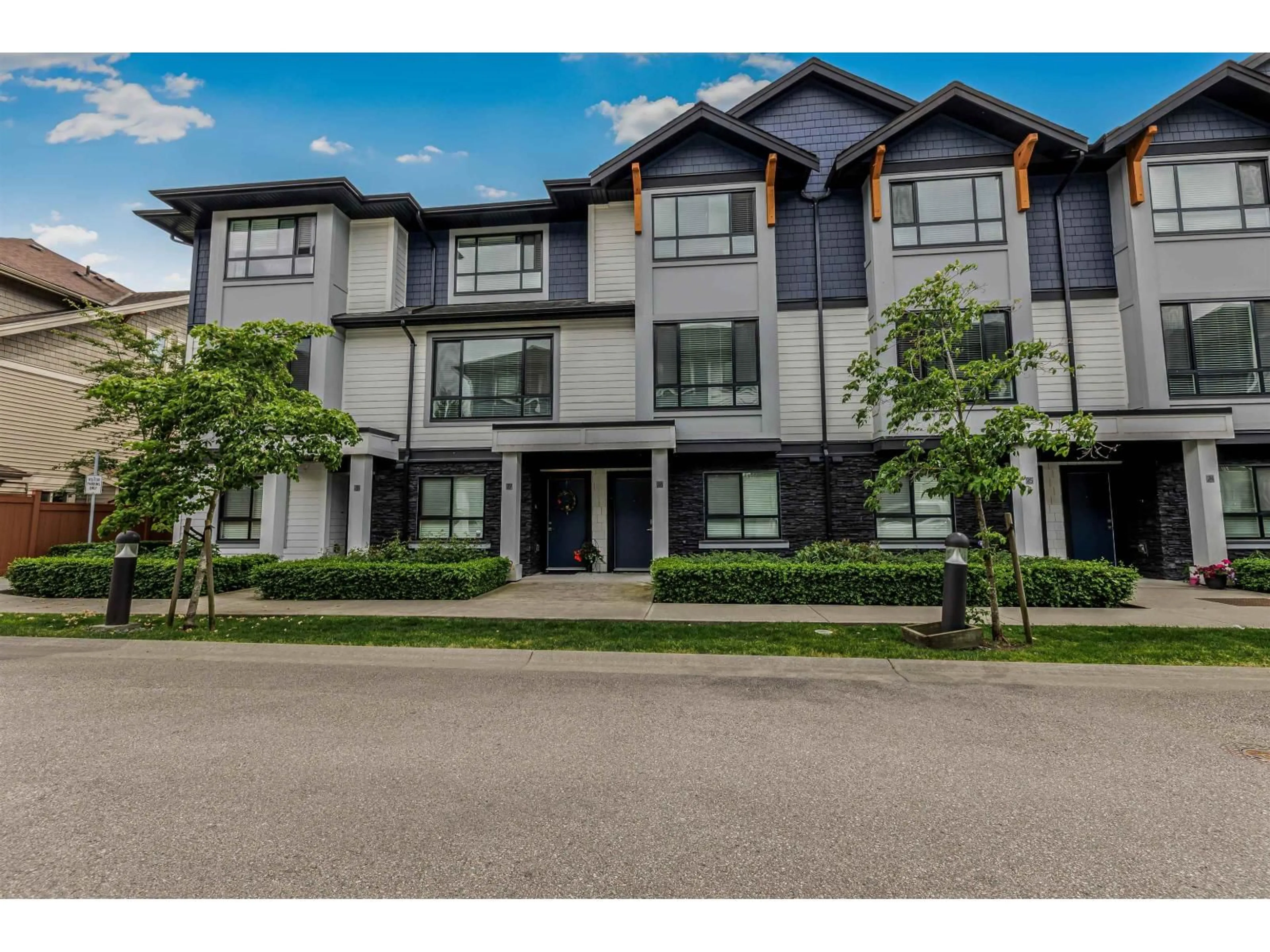 A pic from outside/outdoor area/front of a property/back of a property/a pic from drone, street for 26 - 19704 55A AVENUE, Langley British Columbia V3A0L2