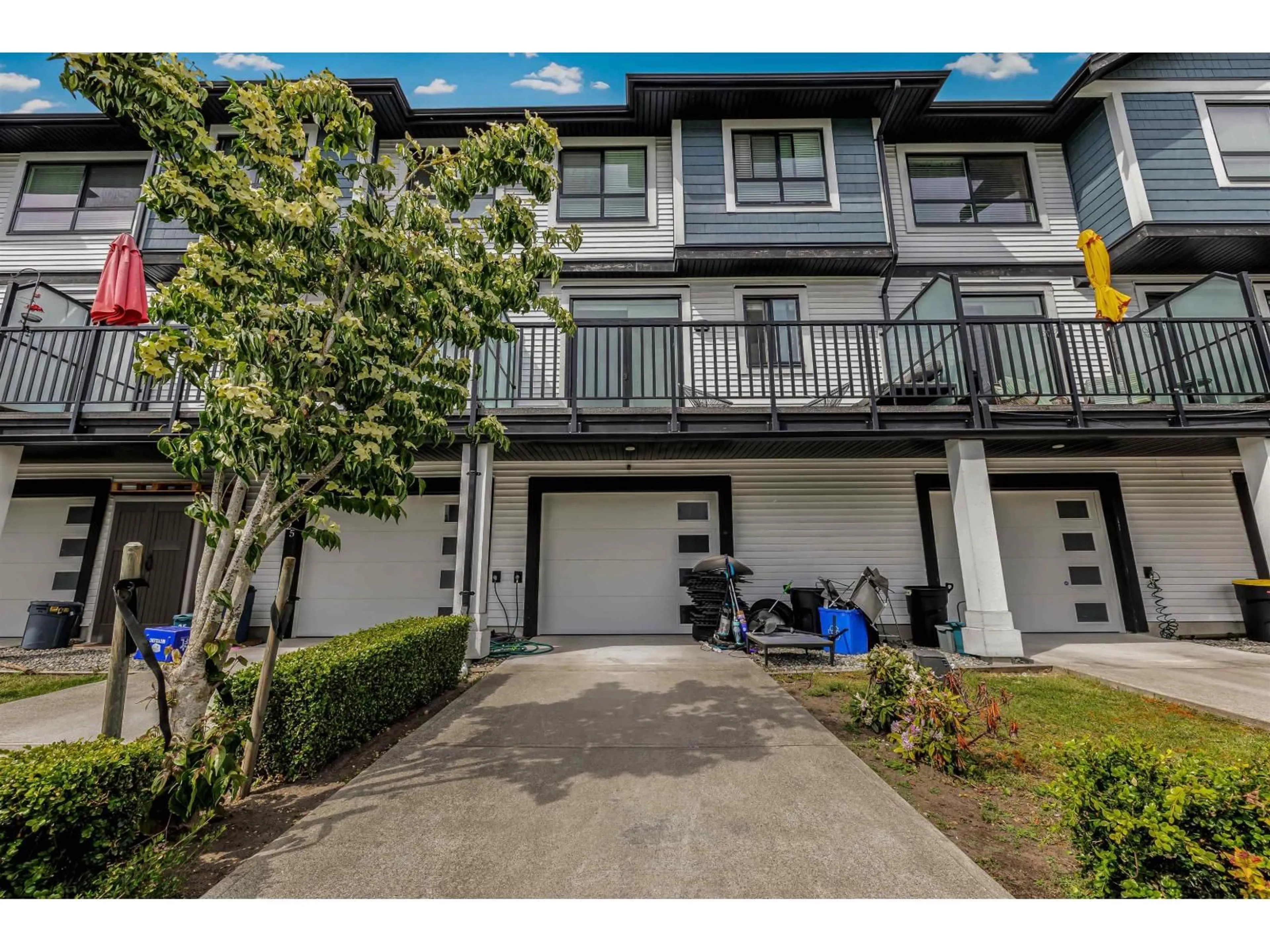 A pic from outside/outdoor area/front of a property/back of a property/a pic from drone, street for 26 - 19704 55A AVENUE, Langley British Columbia V3A0L2