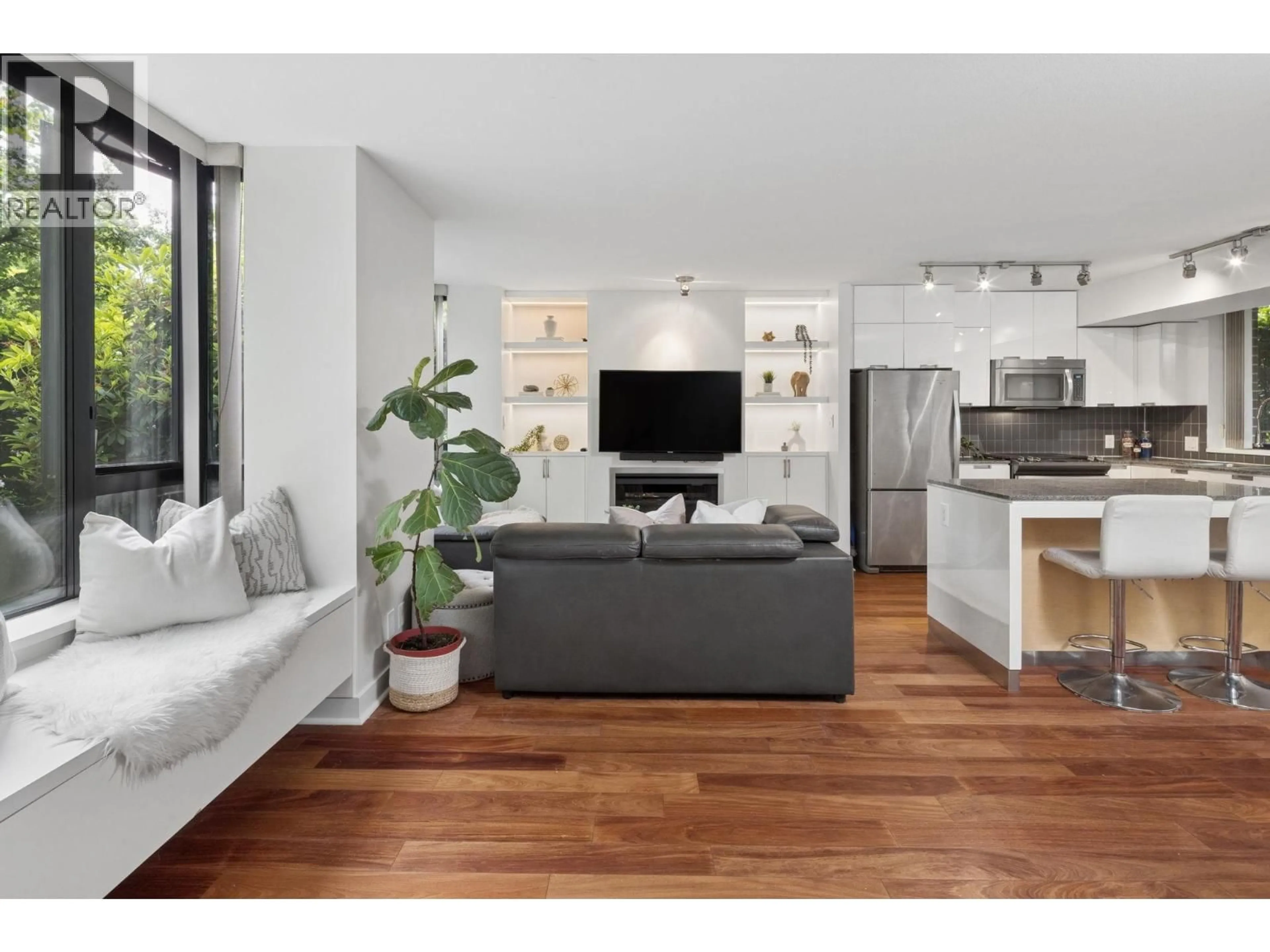 Living room with furniture, wood/laminate floor for 153 2ND STREET, North Vancouver British Columbia V7M1C5