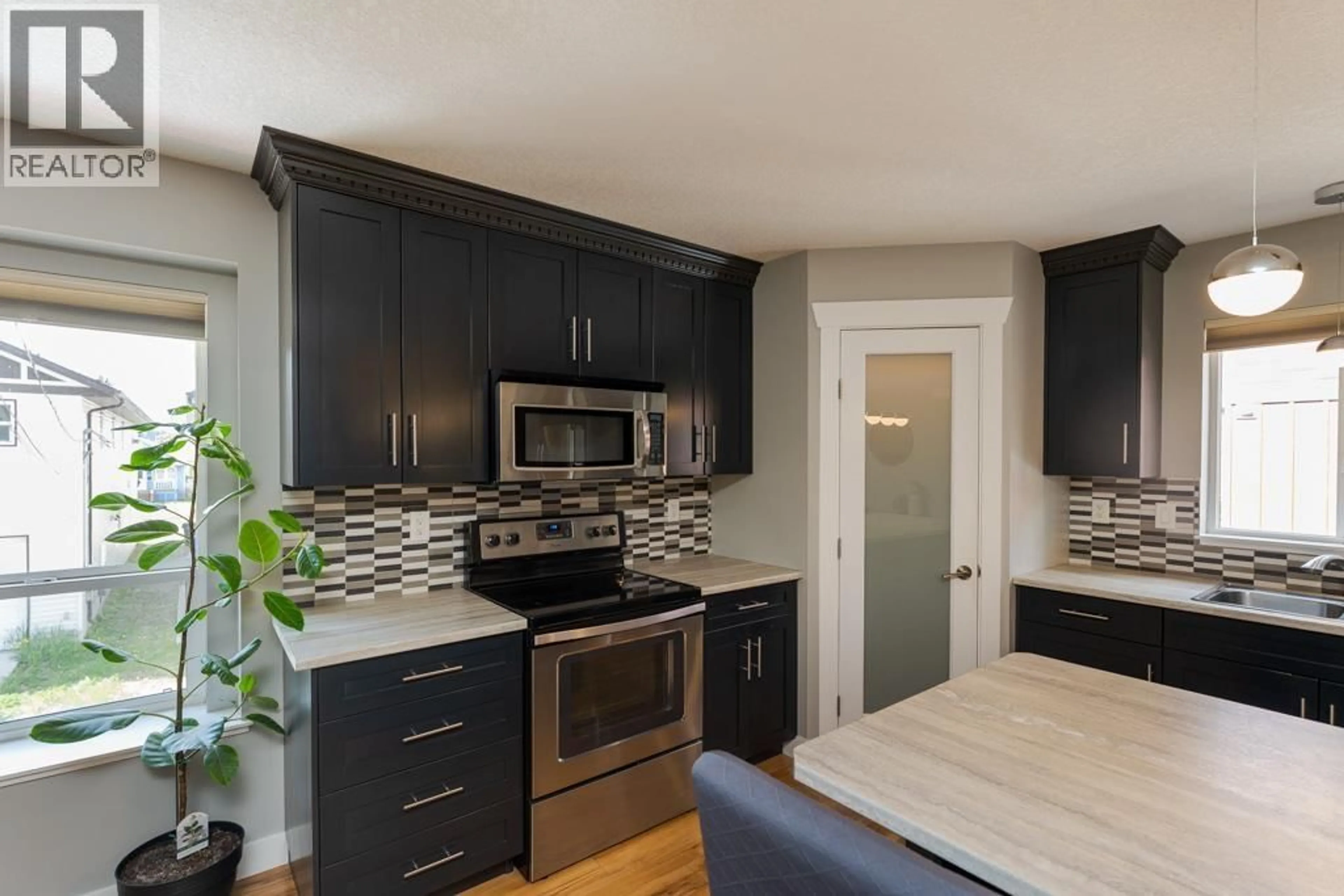 Open concept kitchen, unknown for 104 - 1693 7TH AVENUE, Prince George British Columbia V2L0C1