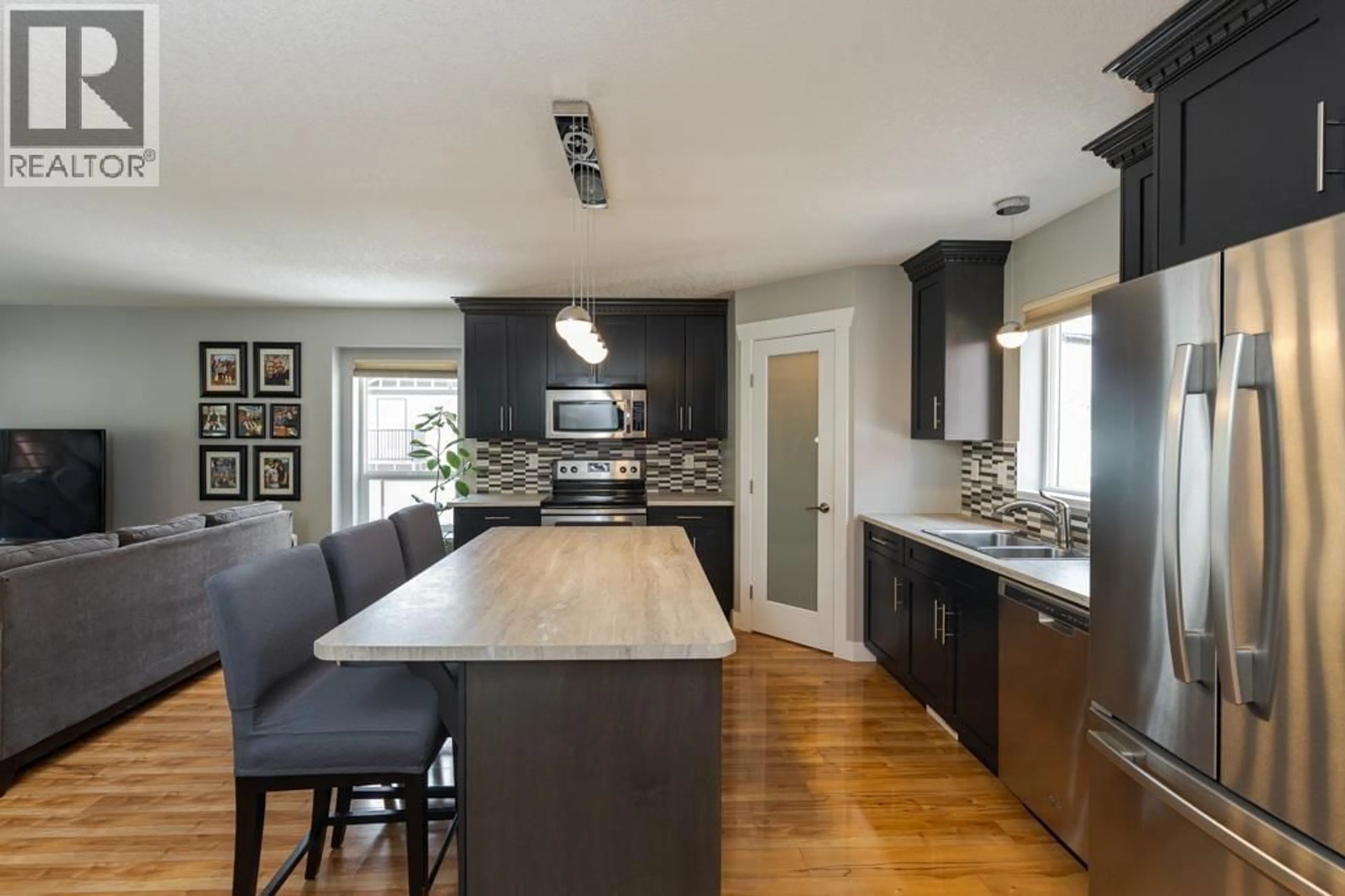 Open concept kitchen, unknown for 104 - 1693 7TH AVENUE, Prince George British Columbia V2L0C1