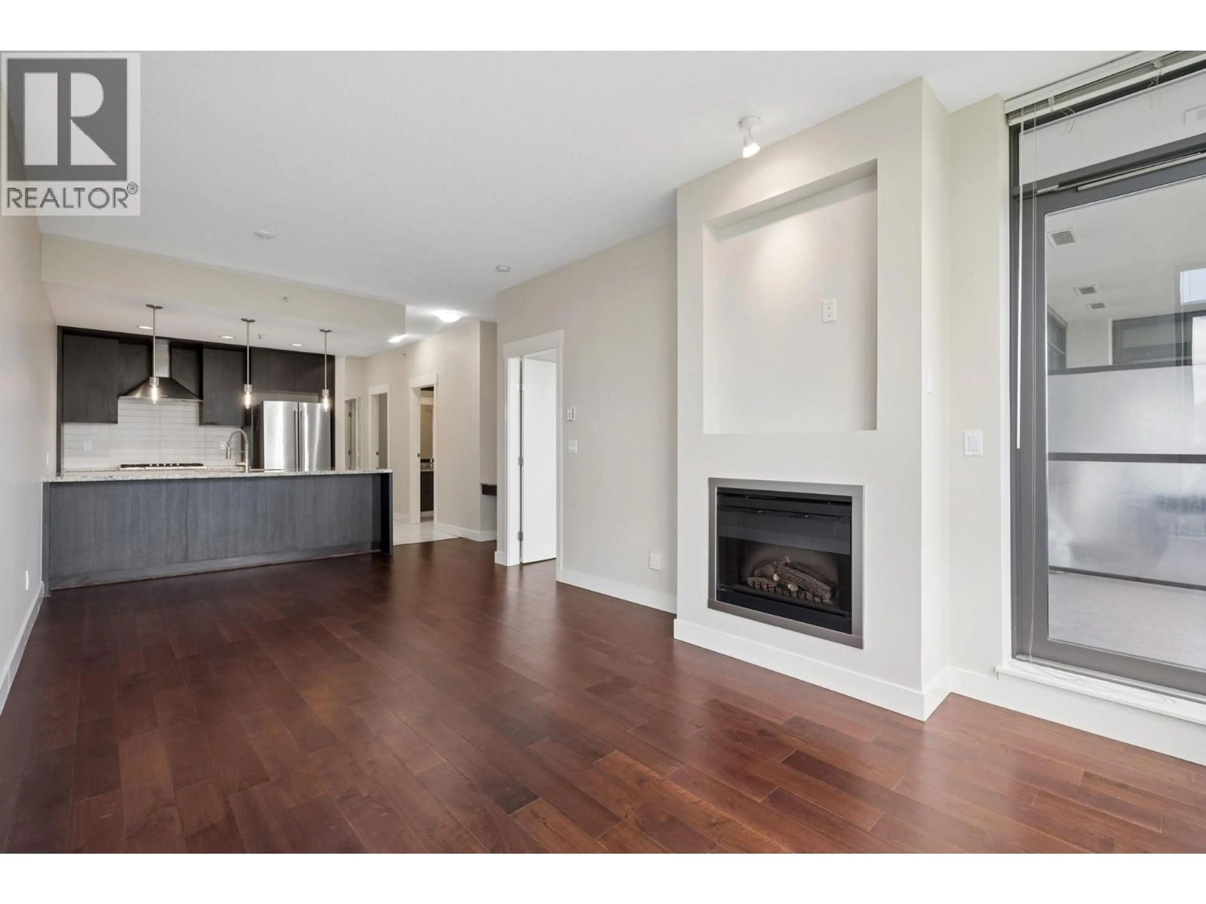 Open concept kitchen, wood/laminate floor for 1201 - 7088 18TH AVENUE, Burnaby British Columbia V3N0A2
