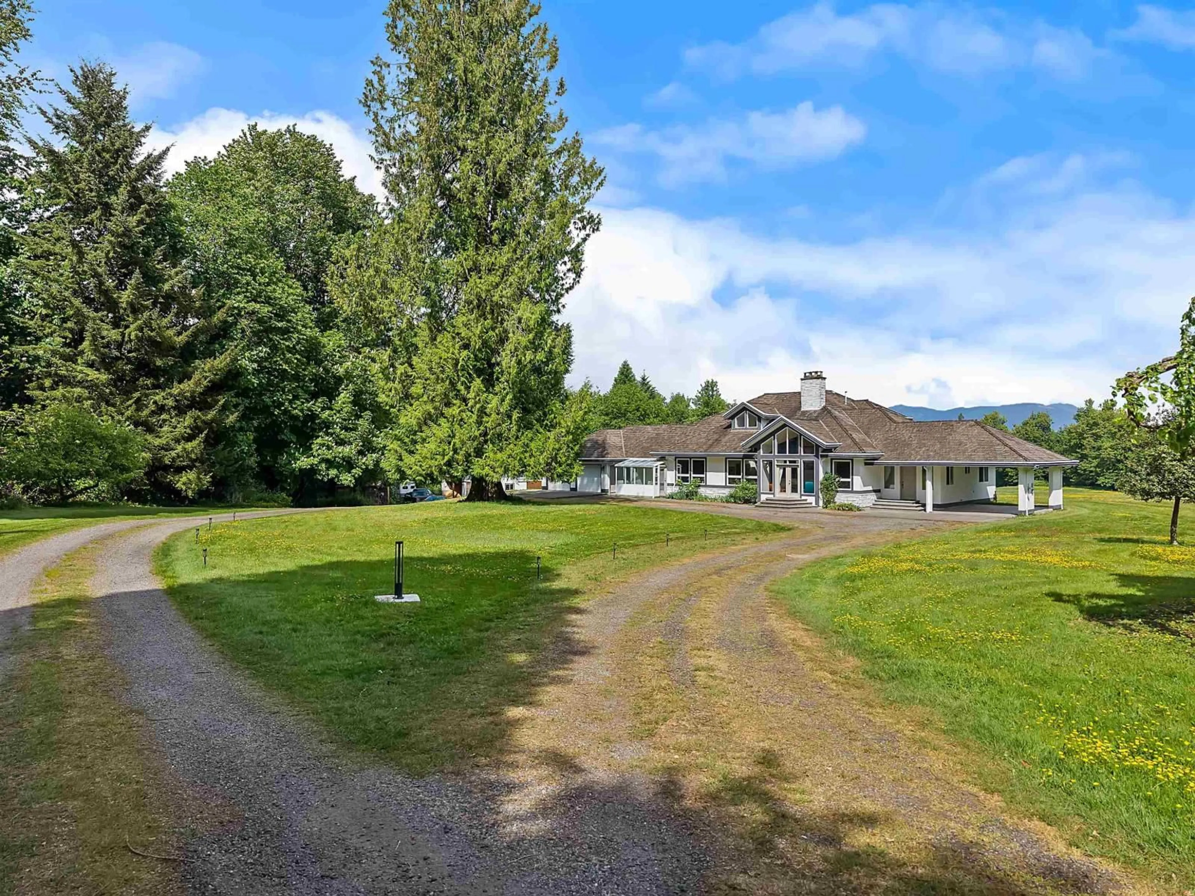 A pic from outside/outdoor area/front of a property/back of a property/a pic from drone, mountain view for 29598 GALAHAD CRESCENT, Abbotsford British Columbia V4X2E4