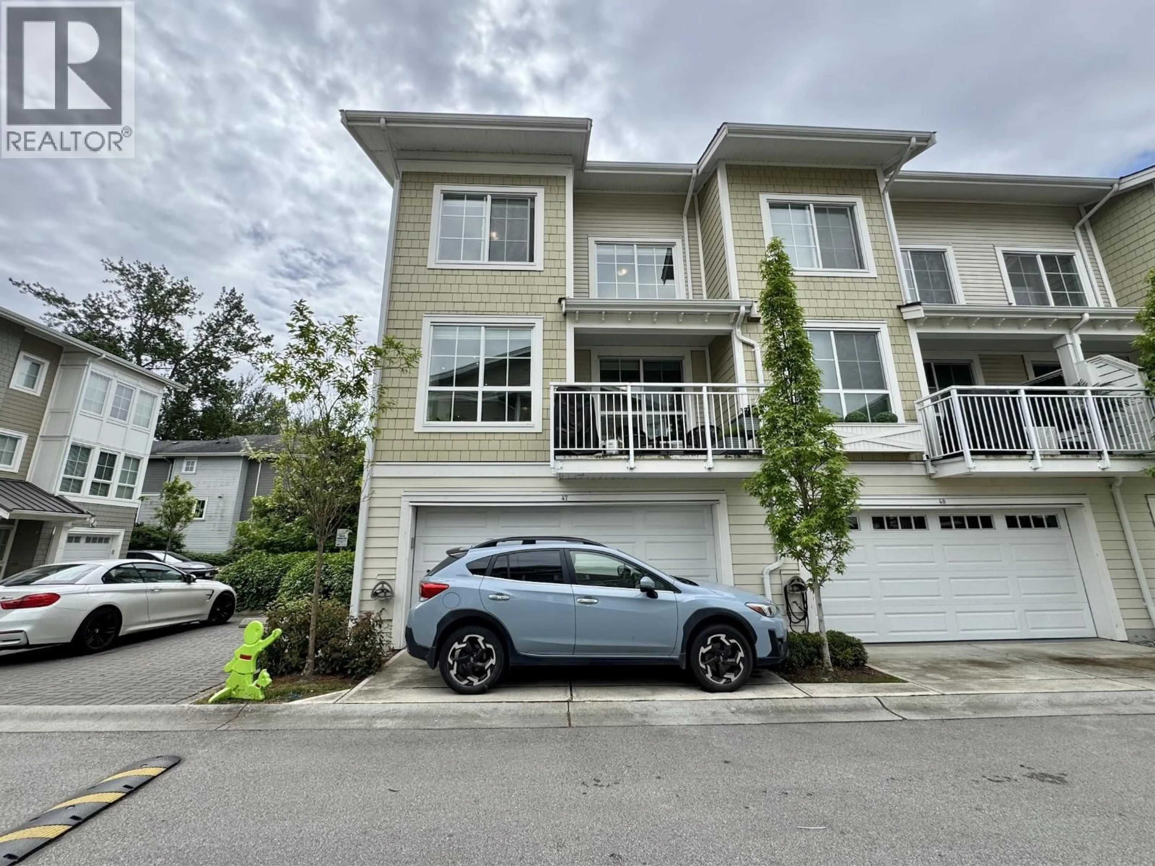 A pic from outside/outdoor area/front of a property/back of a property/a pic from drone, street for 47 - 5551 ADMIRAL WAY, Ladner British Columbia V4K0C9