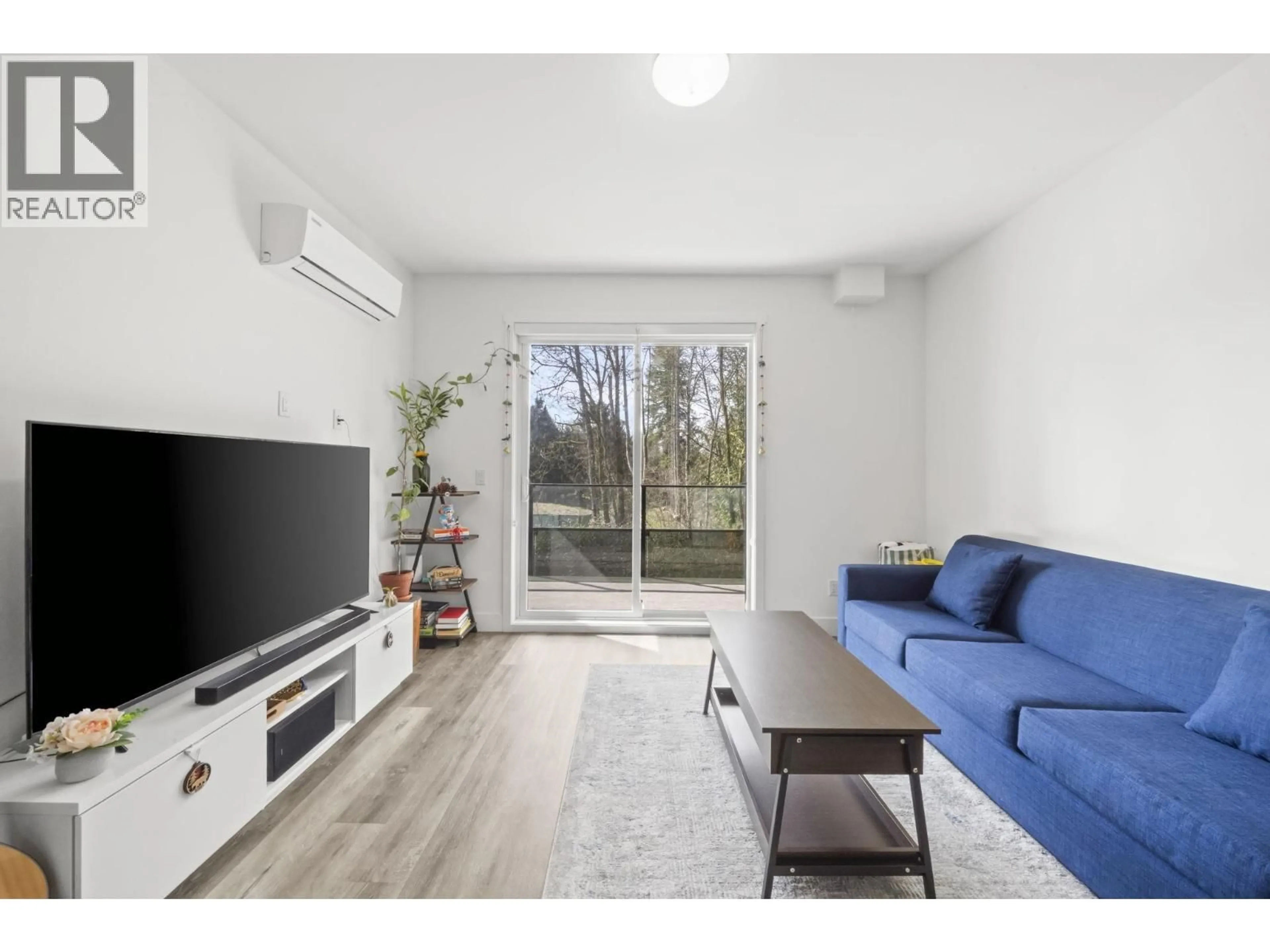Living room with furniture, wood/laminate floor for 213 - 12320 222 STREET, Maple Ridge British Columbia V2X4K8