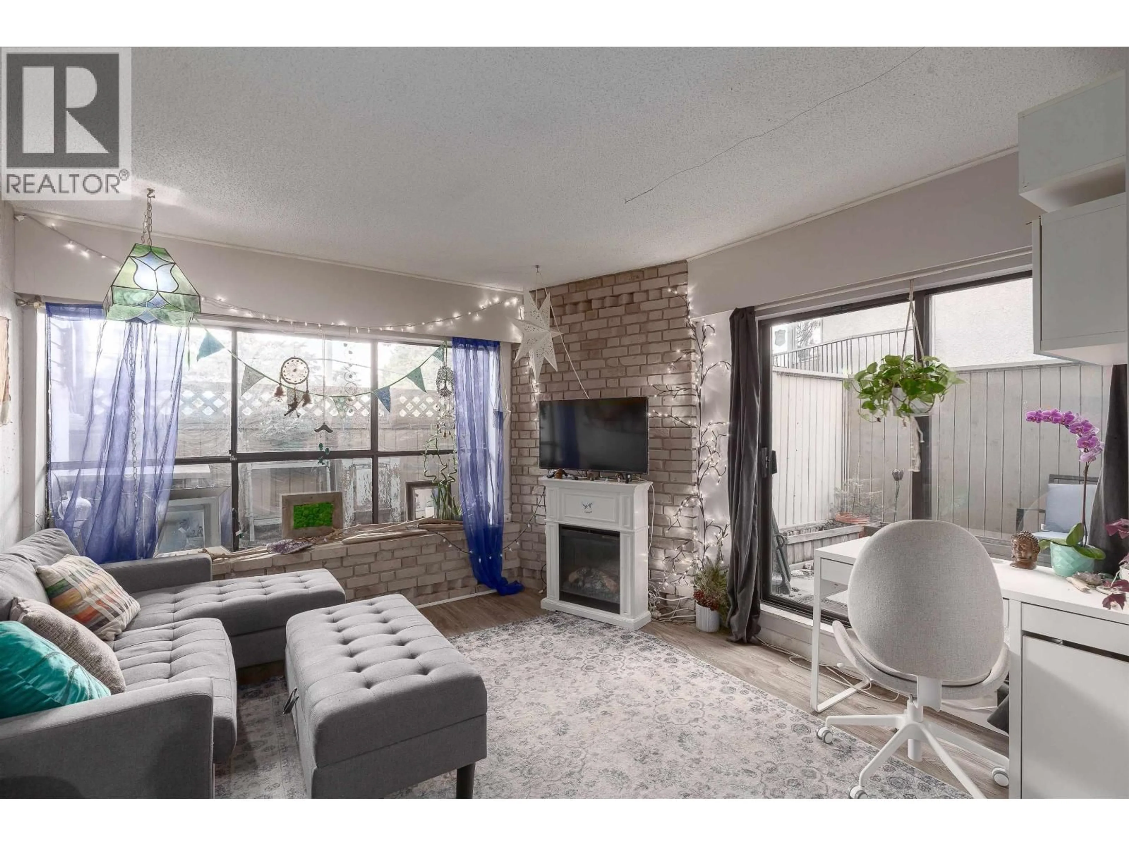 Living room with furniture, unknown for 102 - 2234 PRINCE ALBERT STREET, Vancouver British Columbia V5T4K9