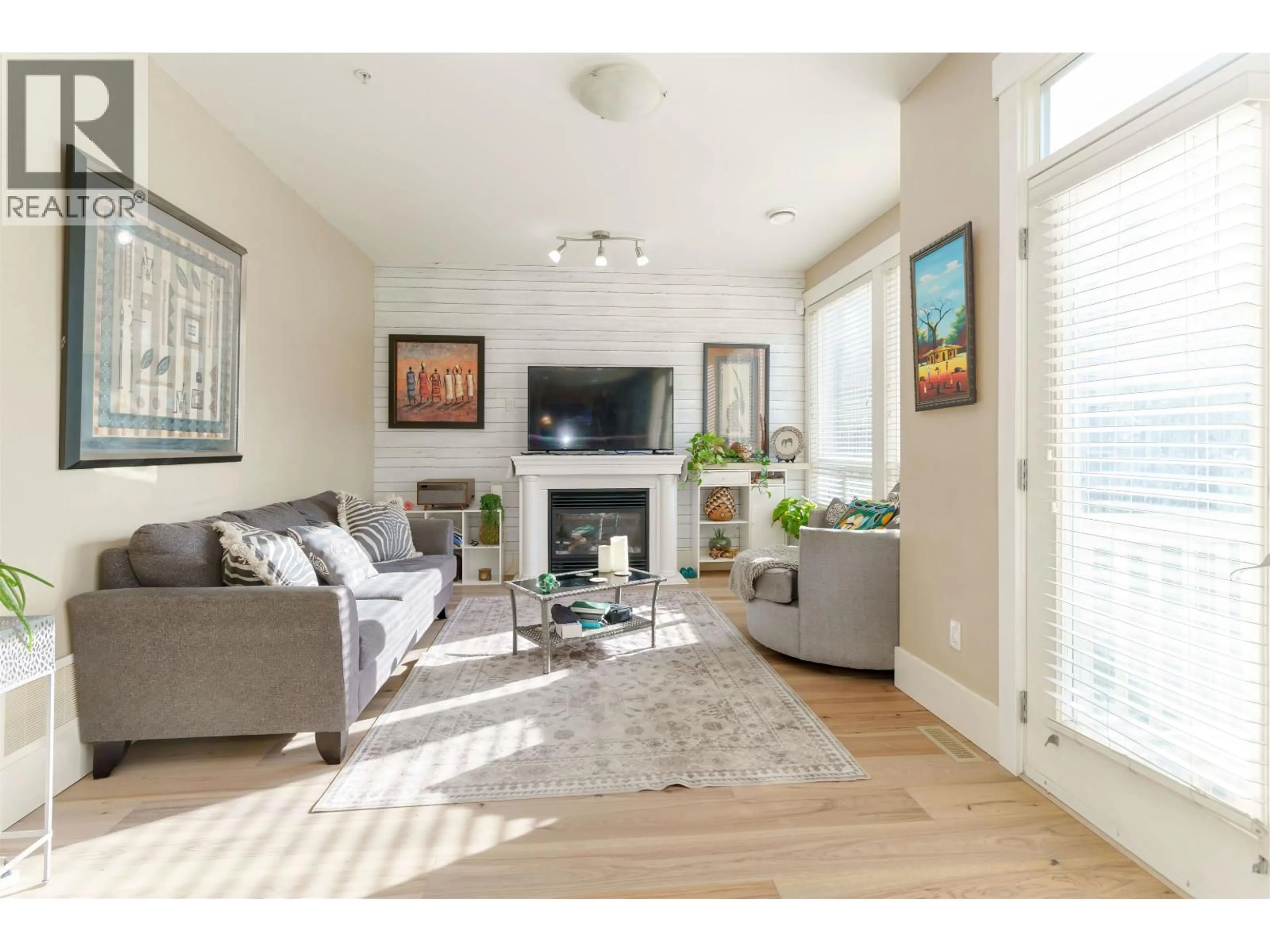 Living room with furniture, wood/laminate floor for 11125 234A STREET, Maple Ridge British Columbia V2W0B7