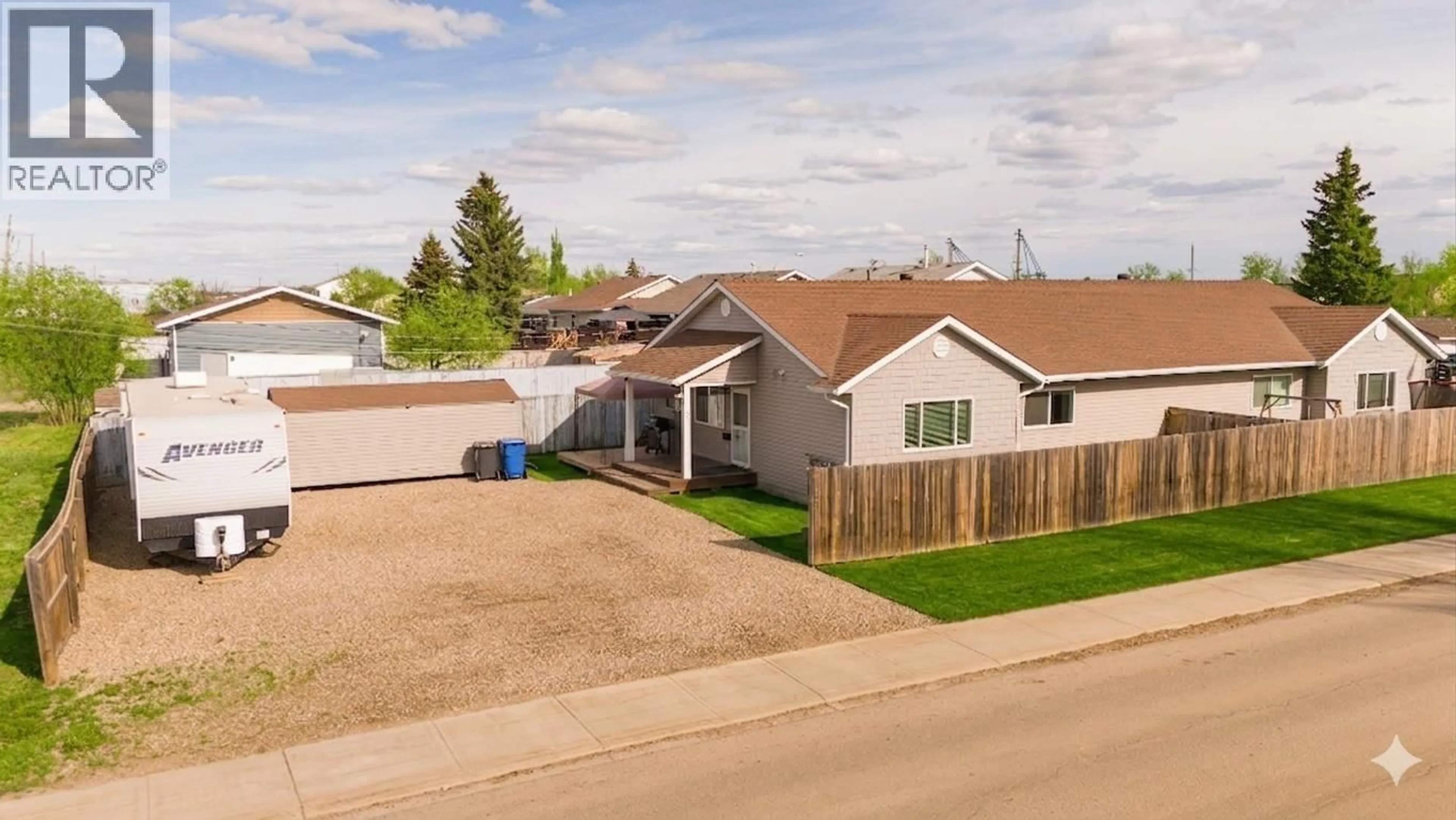 A pic from outside/outdoor area/front of a property/back of a property/a pic from drone, street for 9905 81 STREET, Fort St. John British Columbia V1J6K4