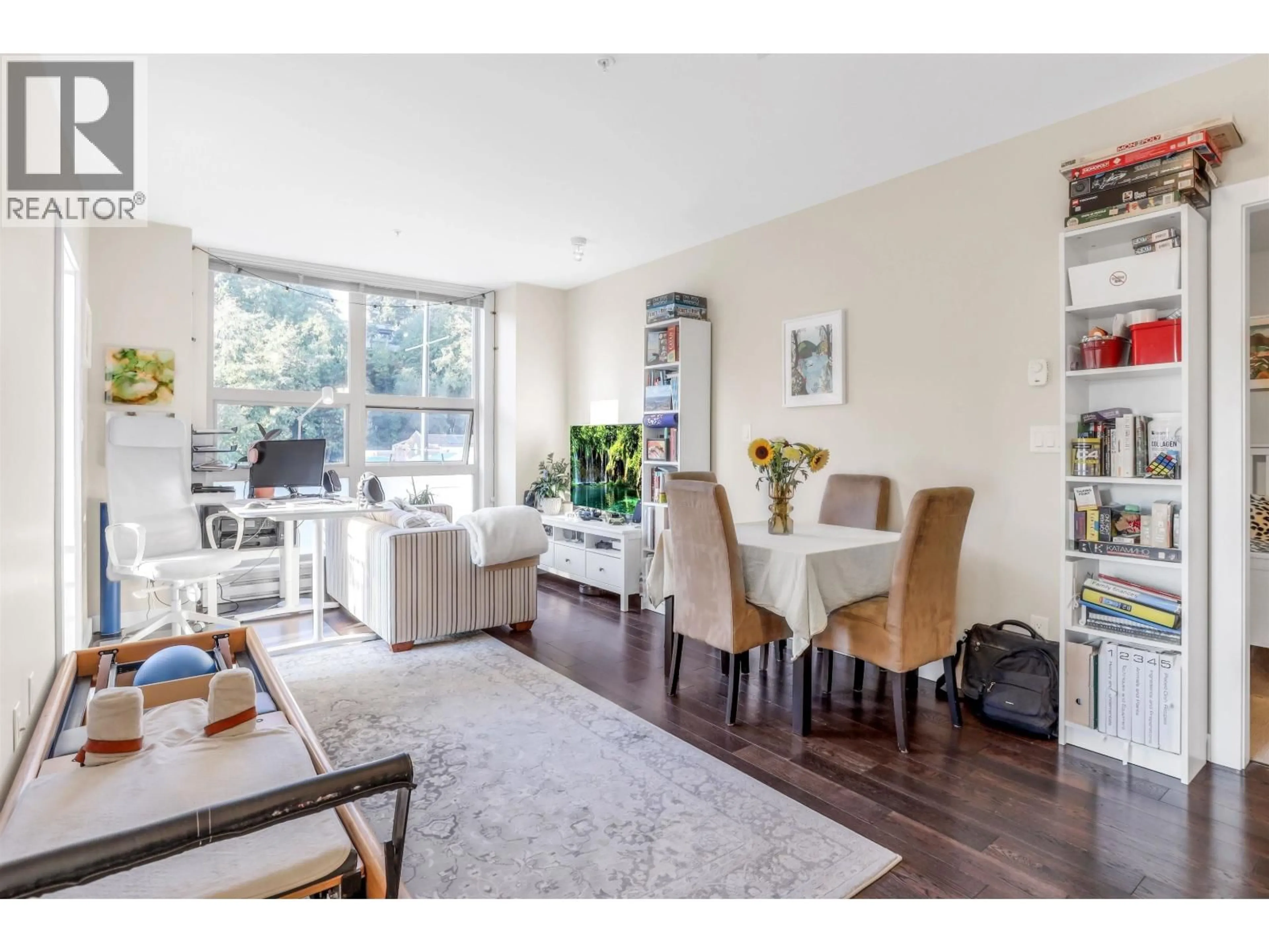 Living room with furniture, wood/laminate floor for 204 - 1177 MARINE DRIVE, North Vancouver British Columbia V7P1T1