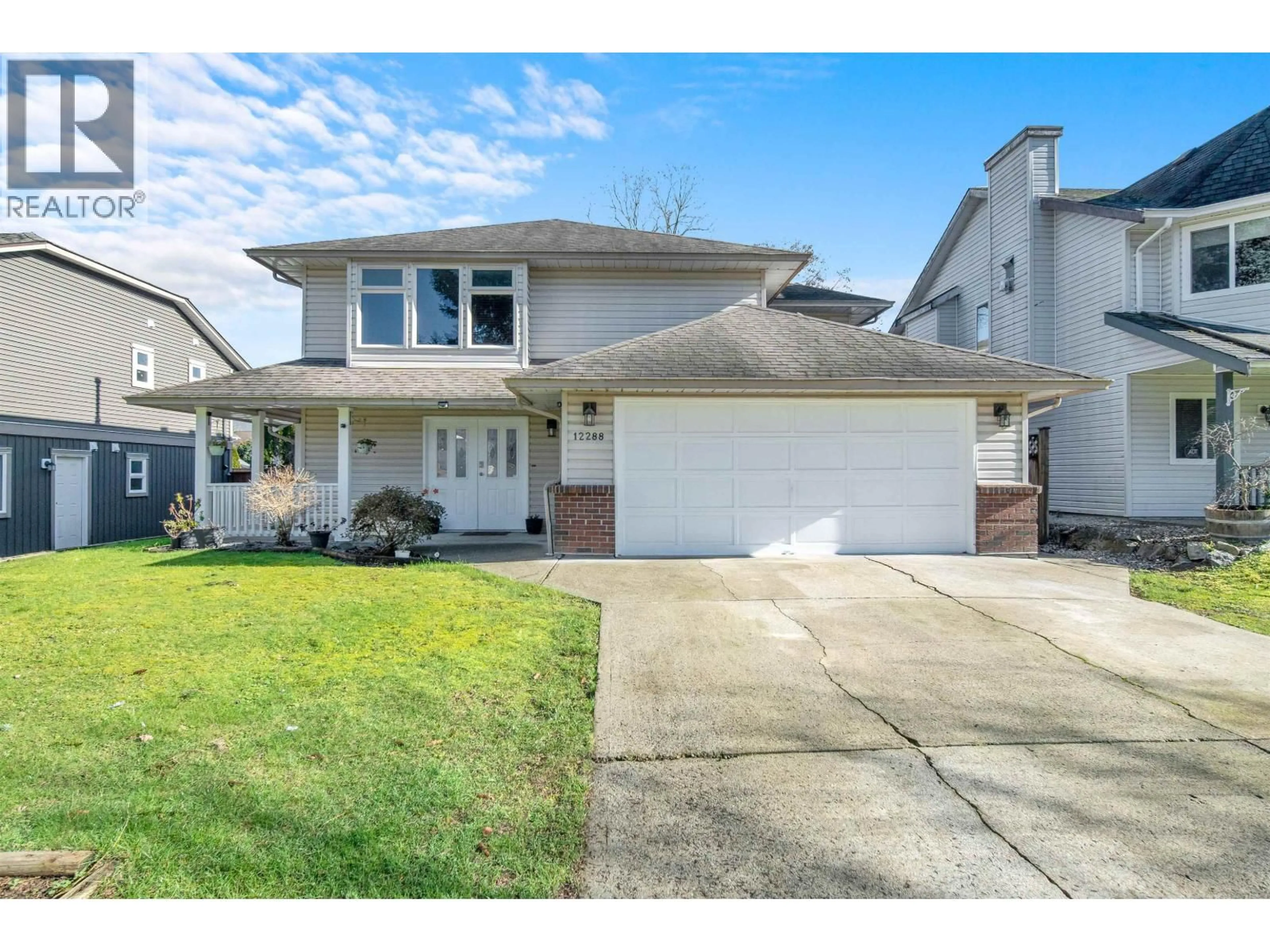 Home with vinyl exterior material, street for 12288 233 STREET, Maple Ridge British Columbia V2X0R9