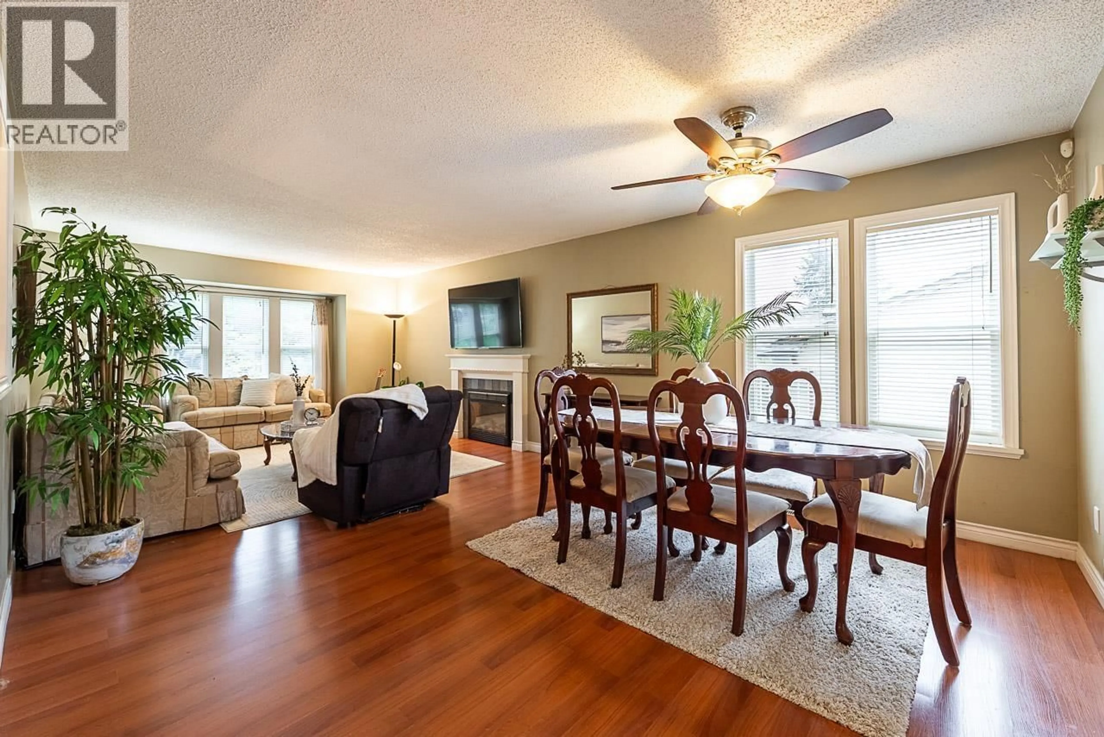 Living room with furniture, wood/laminate floor for 781 CHILKO DRIVE, Coquitlam British Columbia V3C4X2
